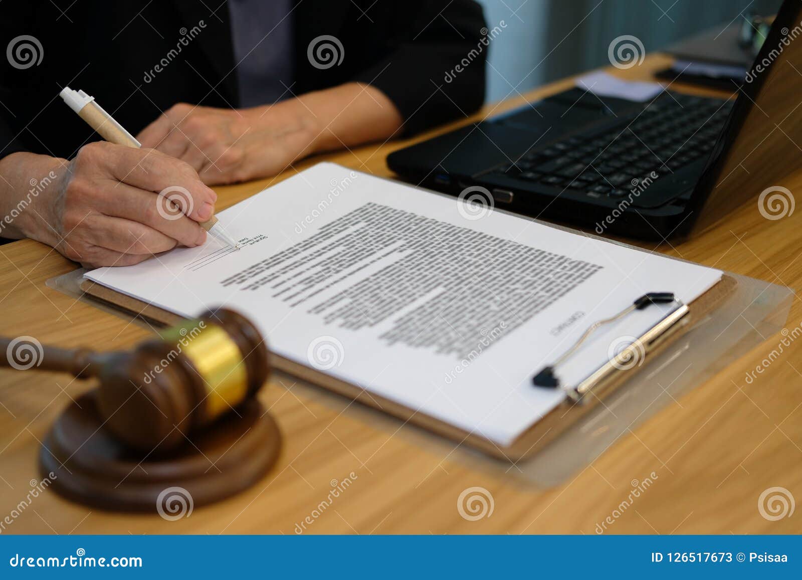 businesswoman sign contract. lawyer with document at law firm