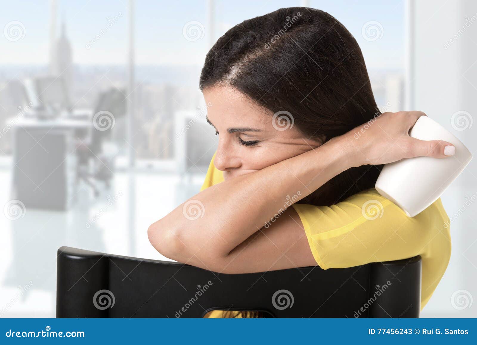 businesswoman sitting in a chair sleeping