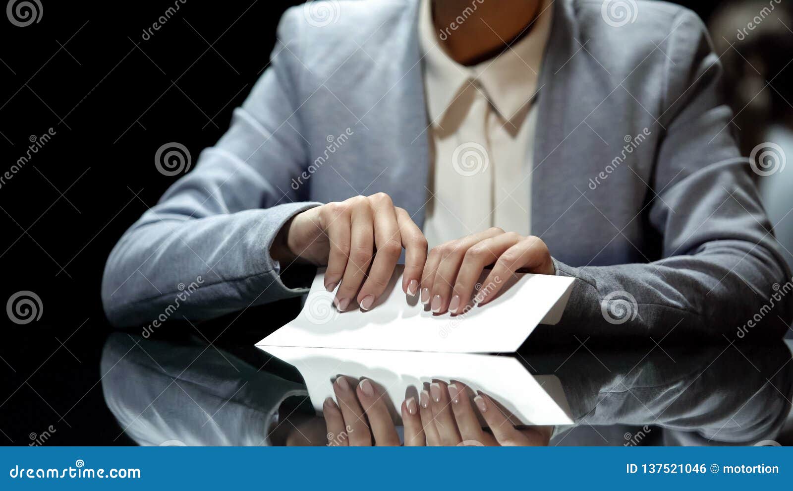 businesswoman taking envelope with money, corruption and tax evasion, close up