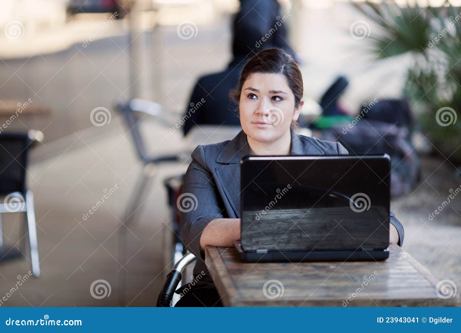 businesswoman - telecommuting from internet cafe