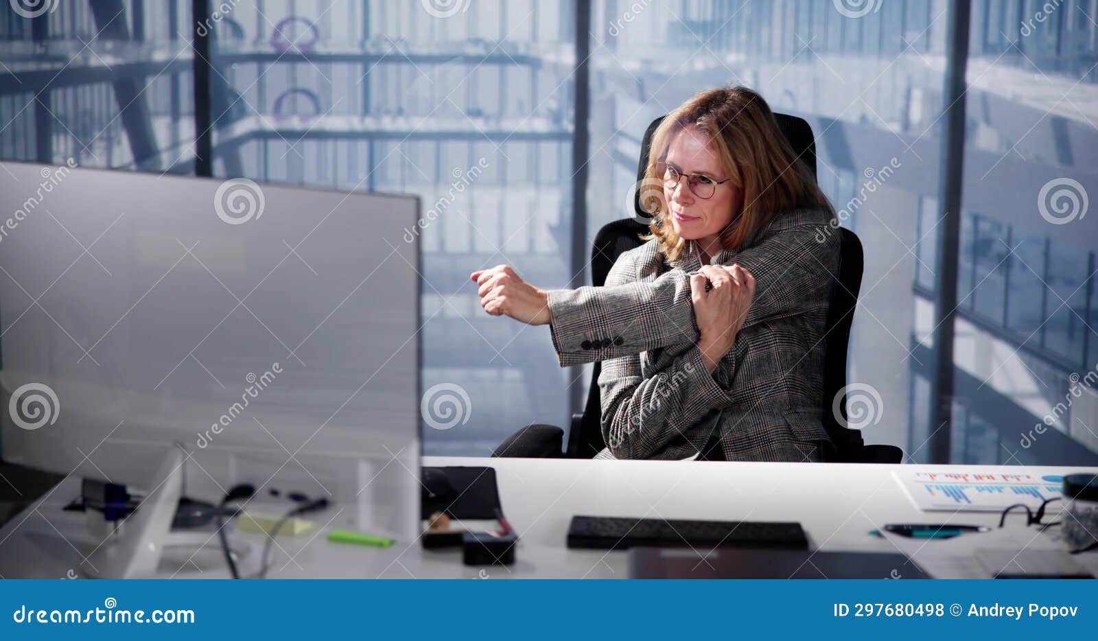 businesswoman using computer to compute