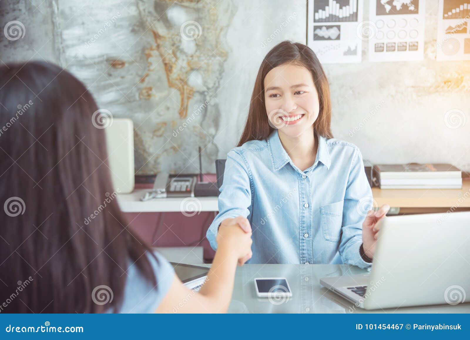 Businesswoman Wearing Blue Shirt Shaking Hand with Partnership Stock ...