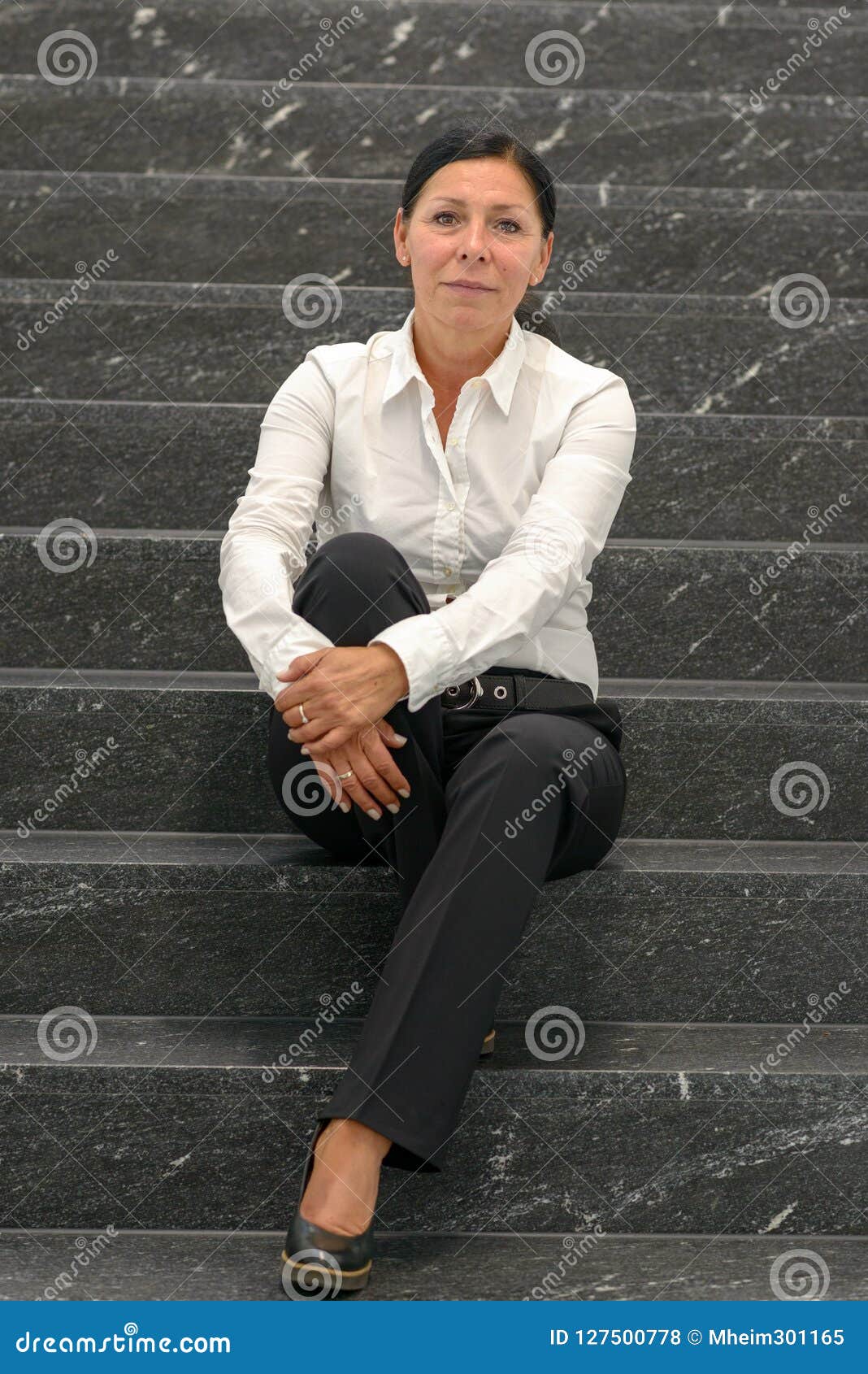 Businesswoman in White Shirt Sitting on Stairs Stock Photo - Image of ...