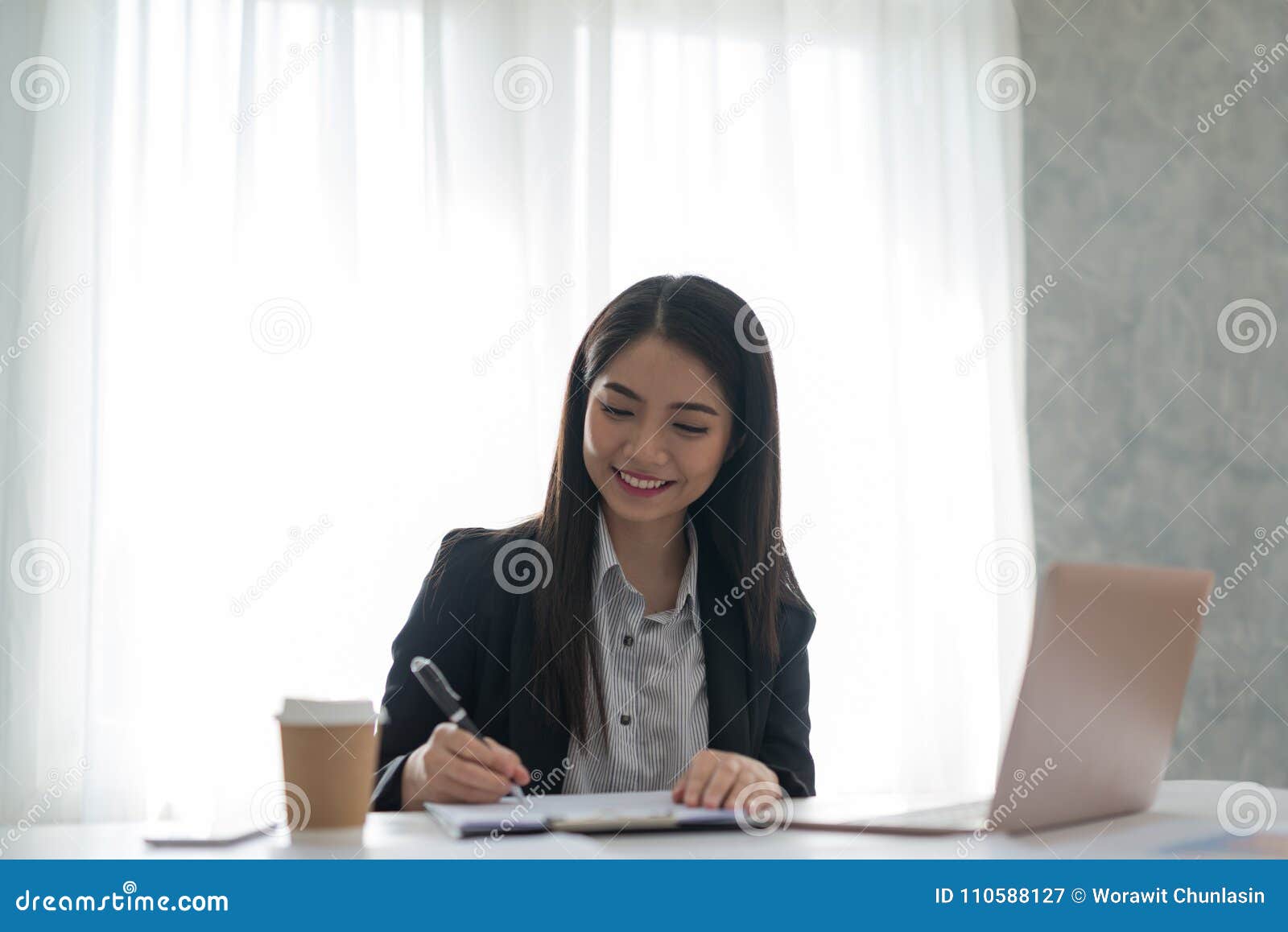 Businesswoman at Work Signing a Contract Paper in Her Workstation Stock ...