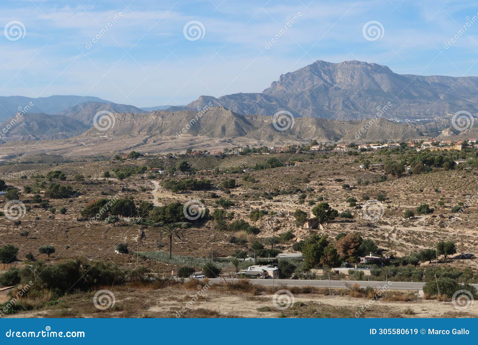 view of penya mitjorn mountain from busot, alicante, spain
