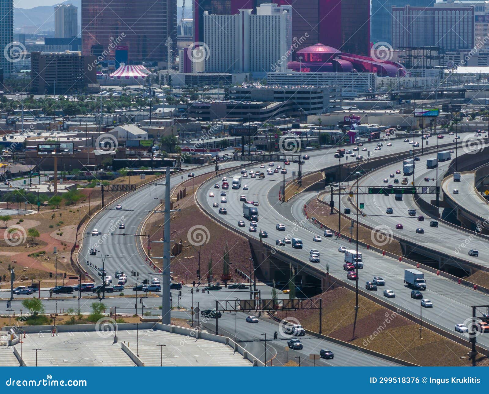 bustling las vegas cityscape with el rio hotel and casino and busy highway interchange on sunny day