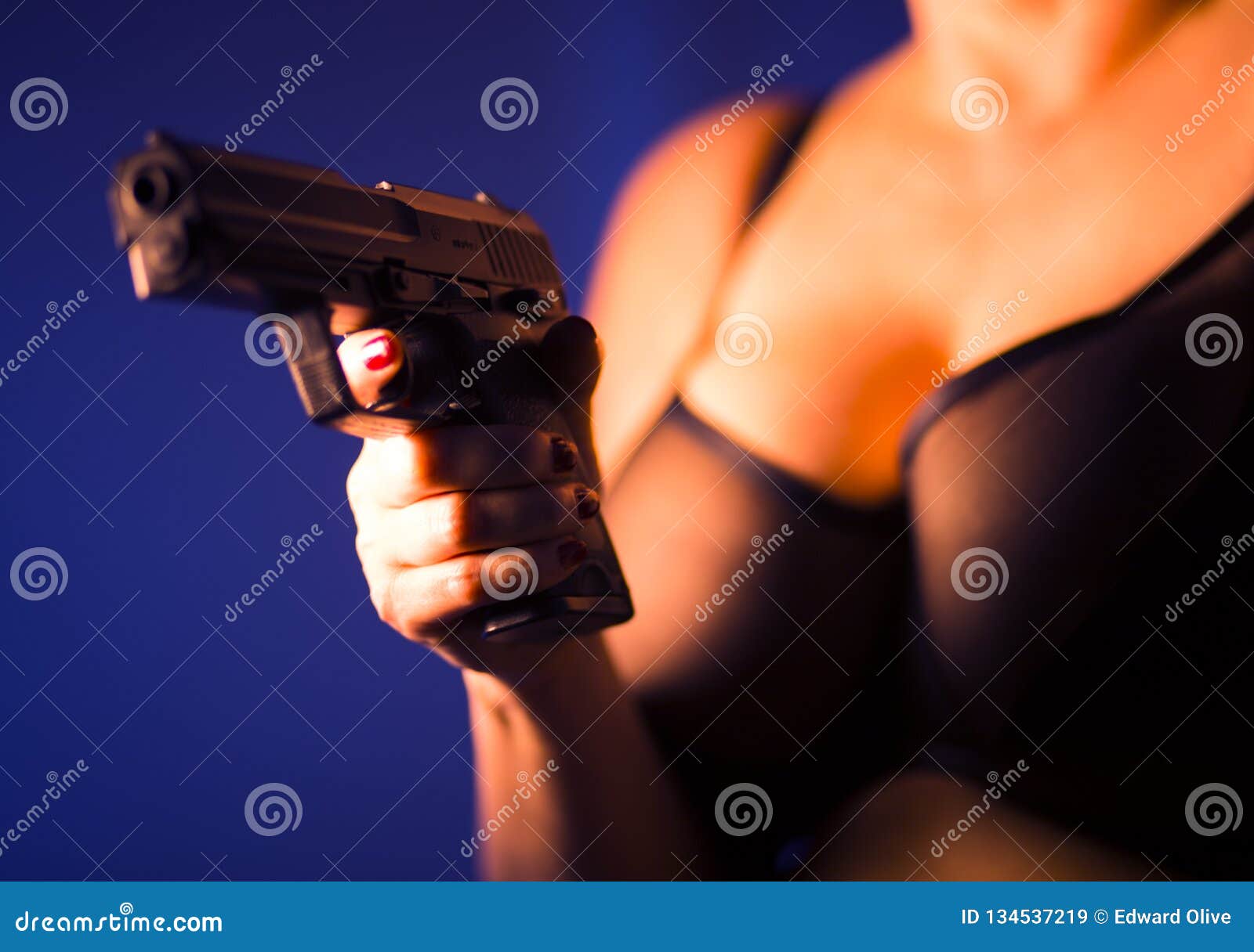 Busty lady killer gun stock image. Image of pistol, attractive - 134537219