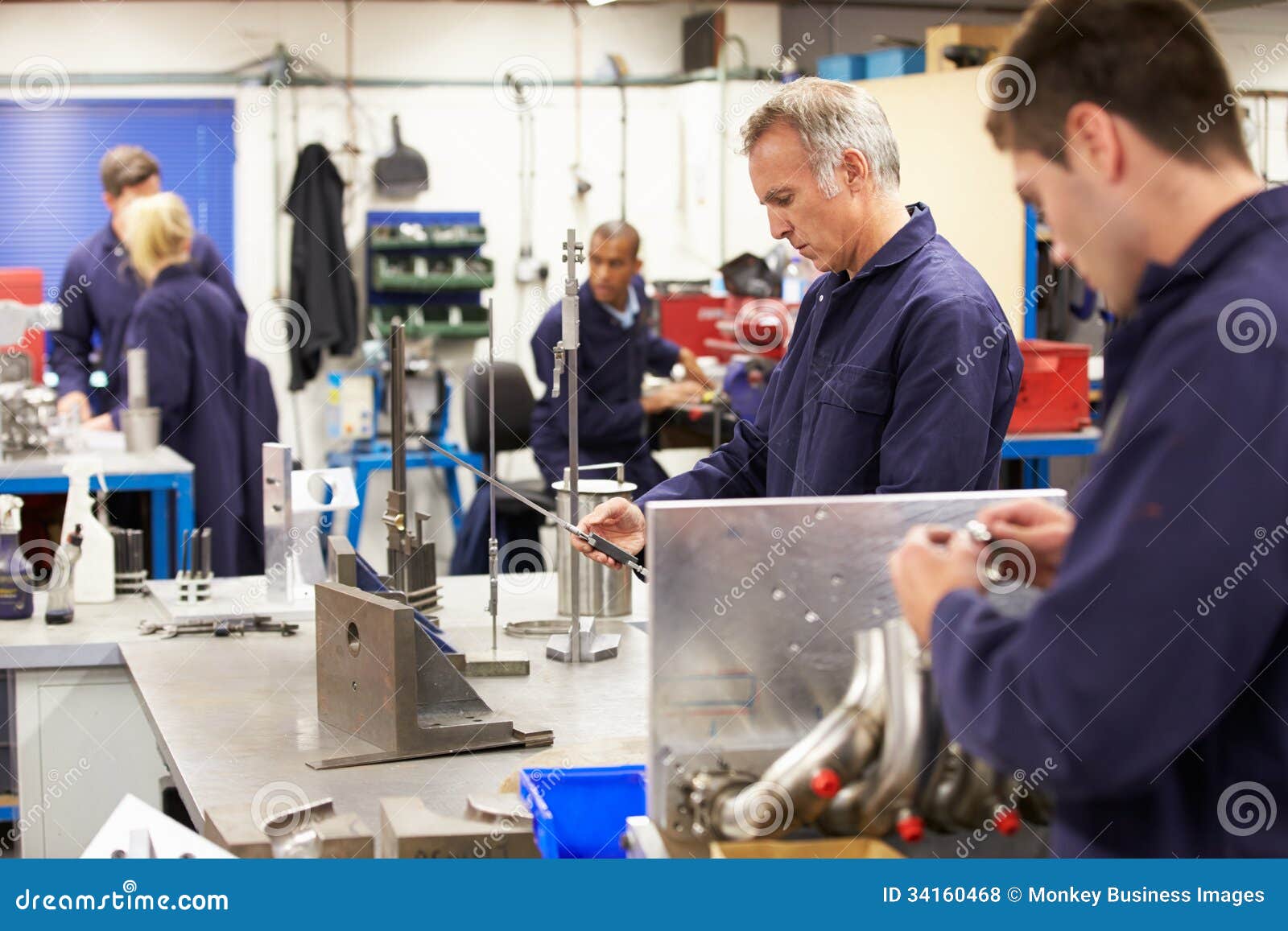 Busy Interior Of Engineering Workshop In Factory