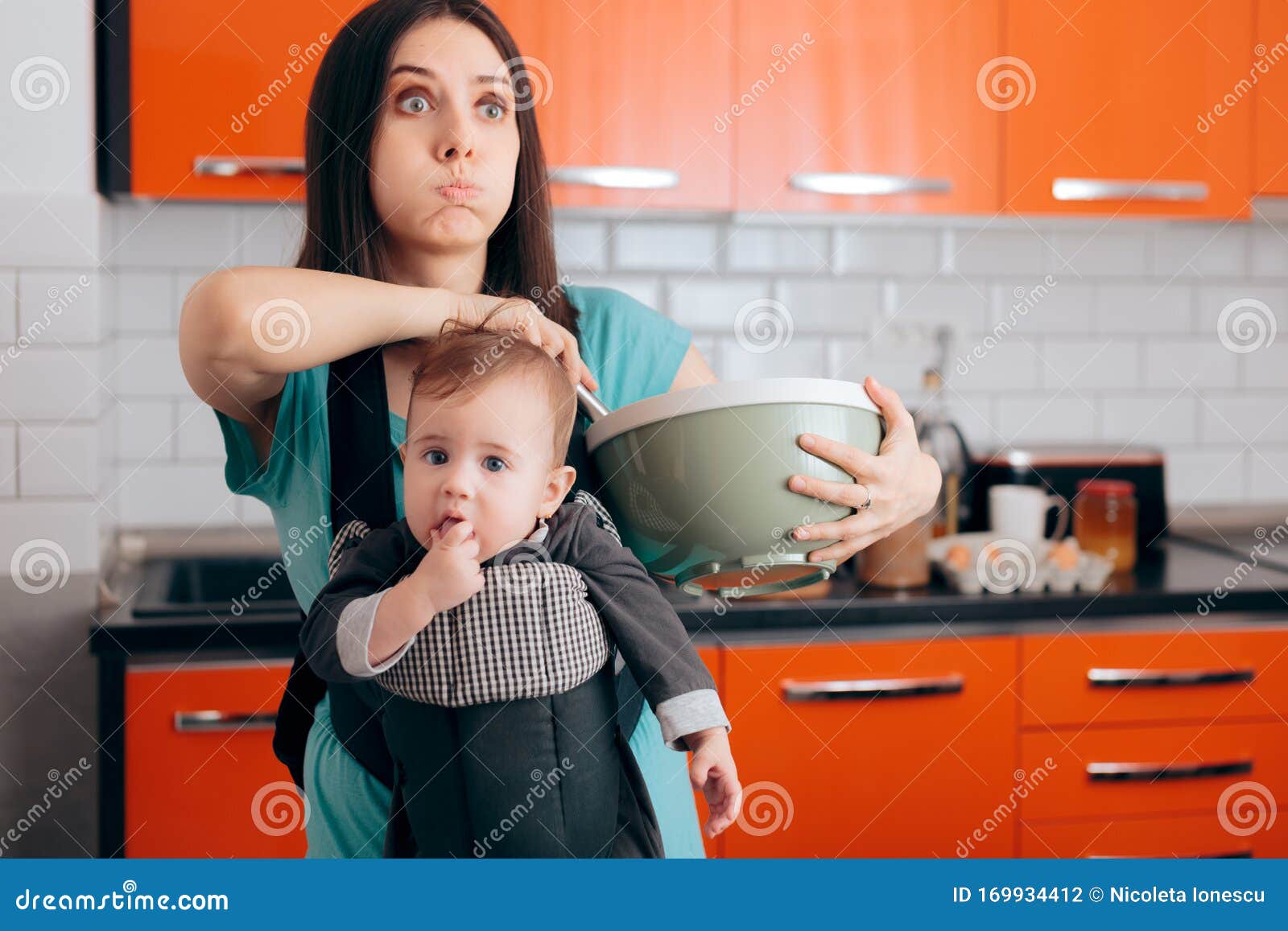 https://thumbs.dreamstime.com/z/busy-mom-cooking-holding-baby-carrier-babywearing-system-making-cookies-carrying-newborn-around-kitchen-169934412.jpg