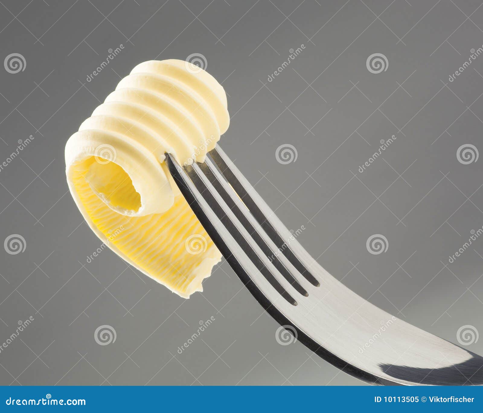 Butter curl on a fork stock image. Image of studio, metal 10113505