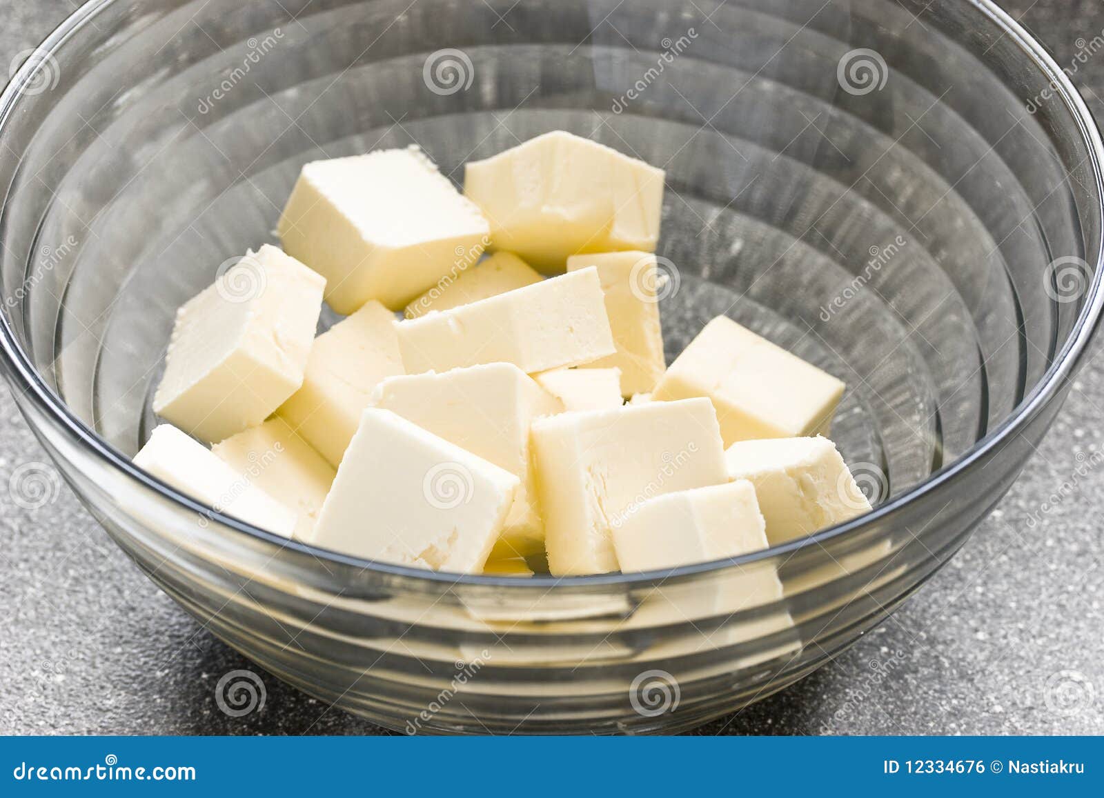 Butter cuts in a bowl stock photo. Image of food, life 12334676