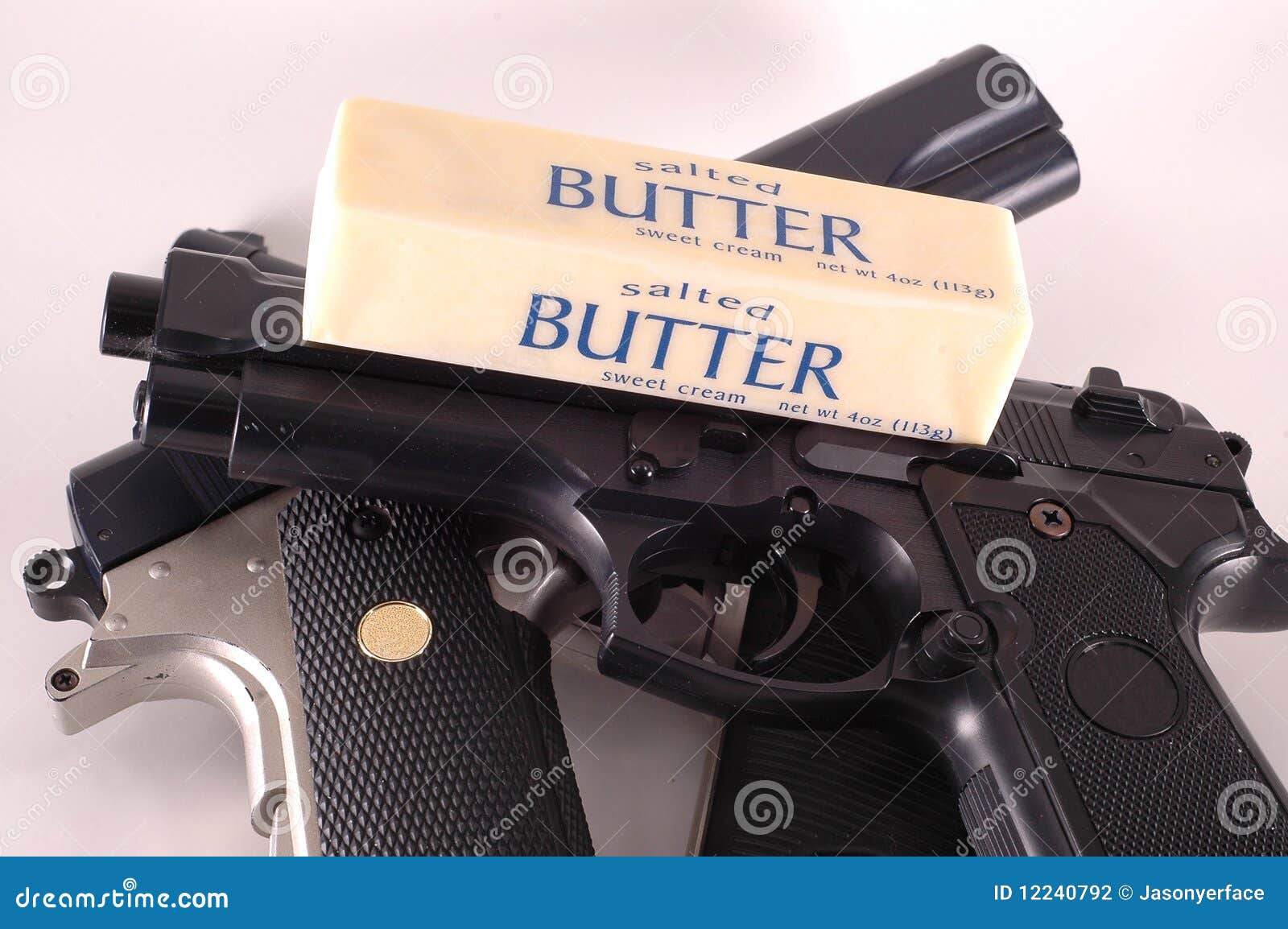 butter wins stock photo image of guns sidearms politics 12240792
