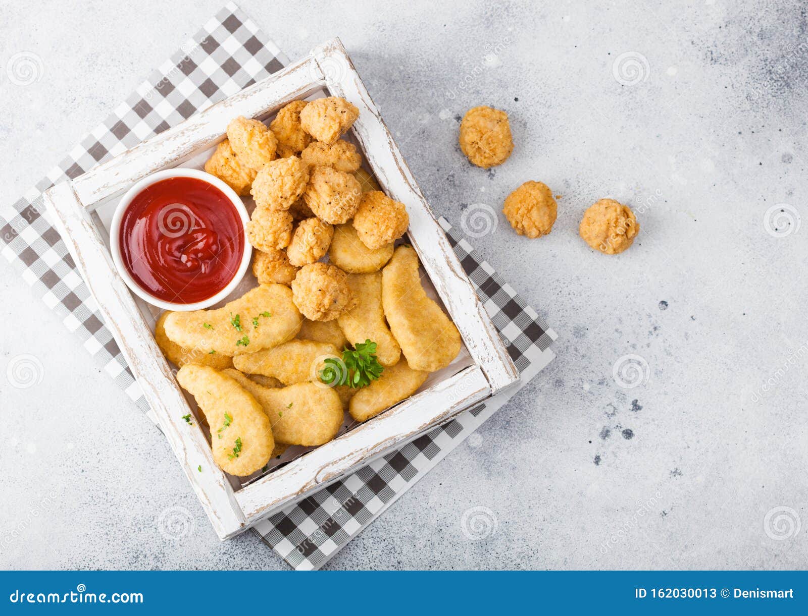 Buttered Chicken Nuggets and Popcorn Bites in White Vintage Wooden Box with  Ketchup on Light Background. Top View Stock Image - Image of gold, breast:  162030013