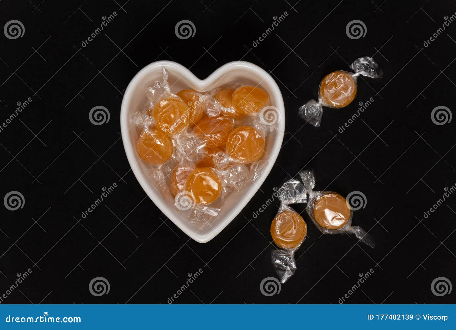 Butterscotch Candy in a Heart Shaped Bowl Stock Image Image of dark