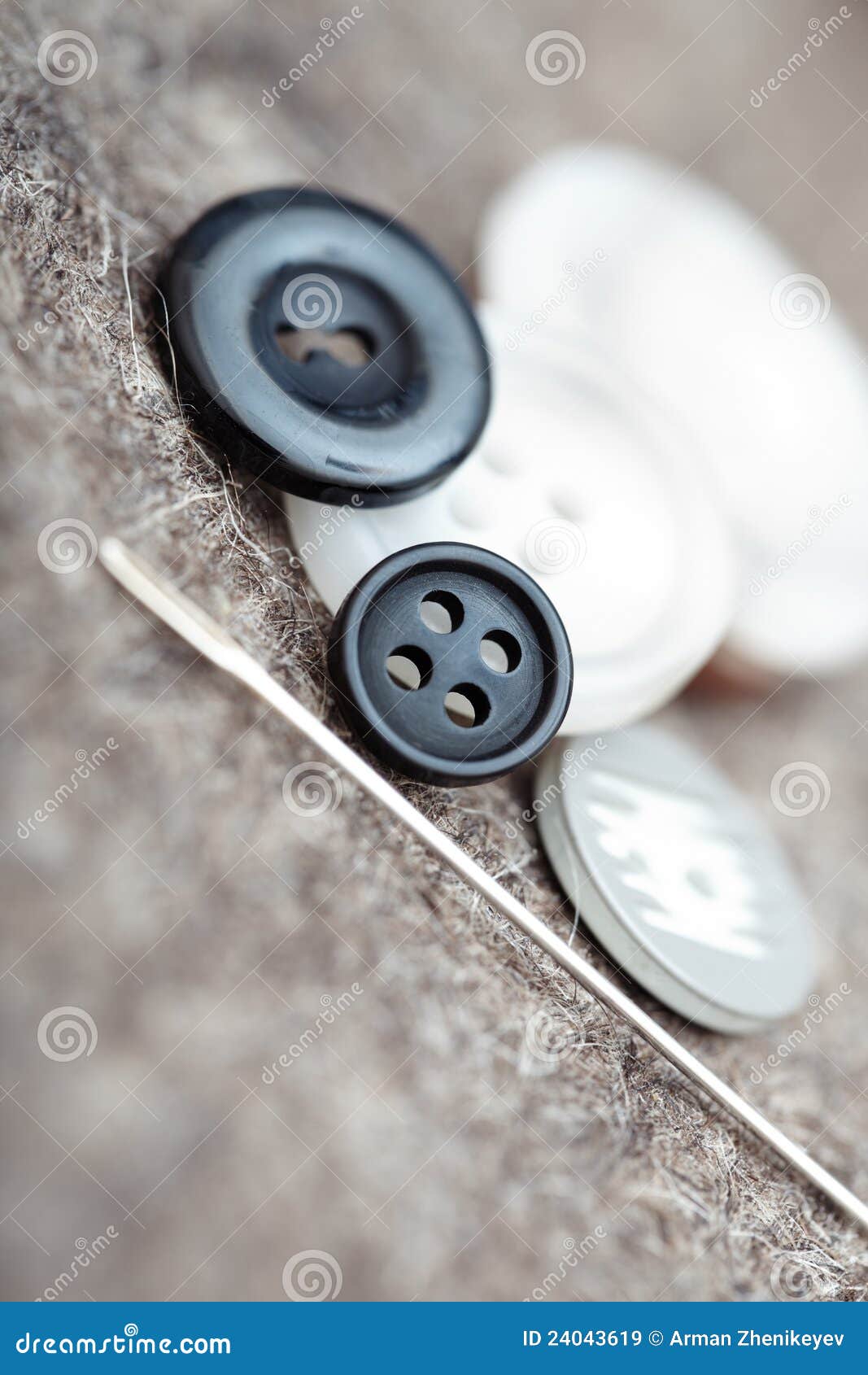 Buttons and sewing needle stock image. Image of black 24043619