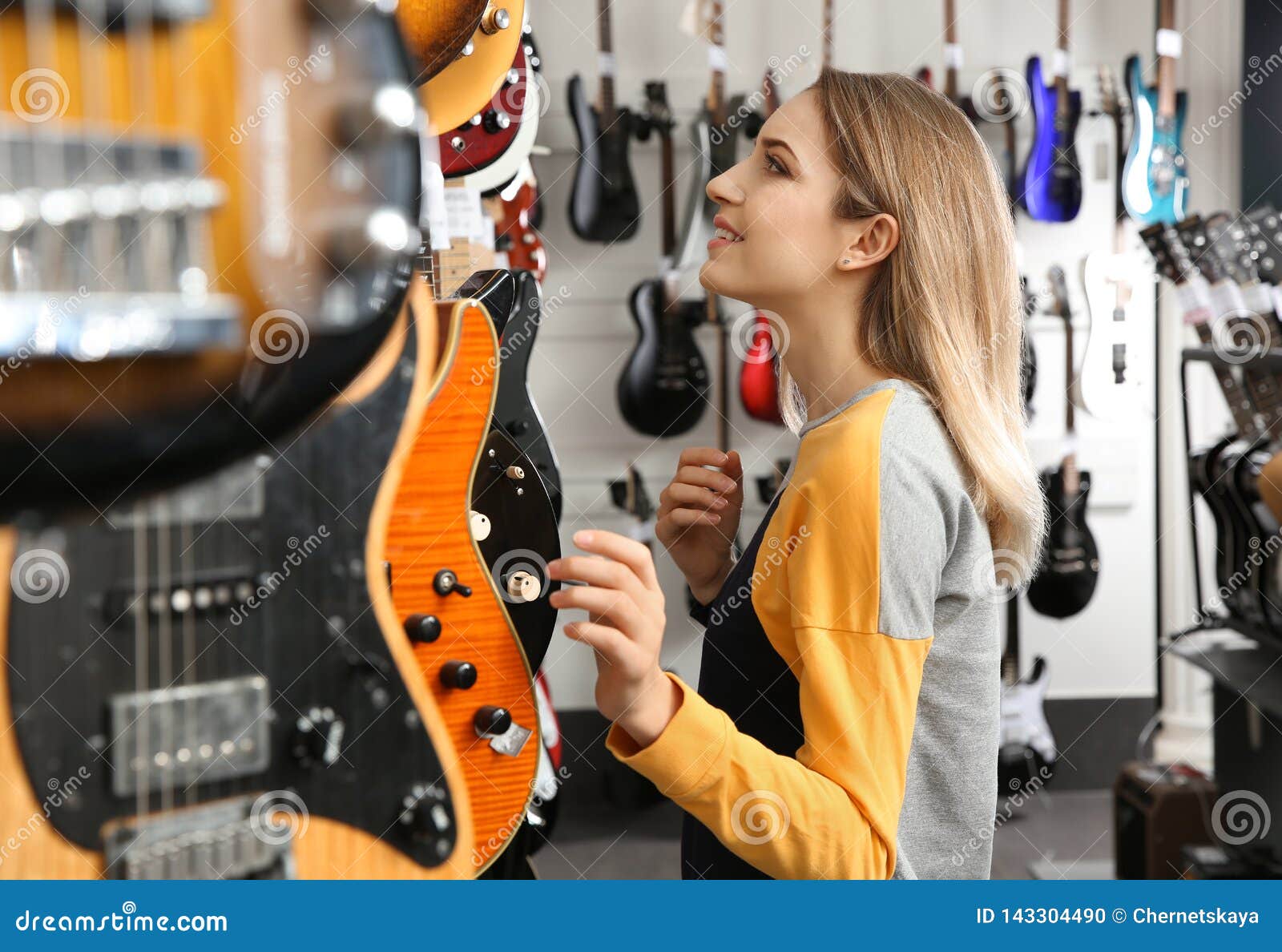 Buyer Choosing Guitar in Music Store Stock Photo Image of instrument