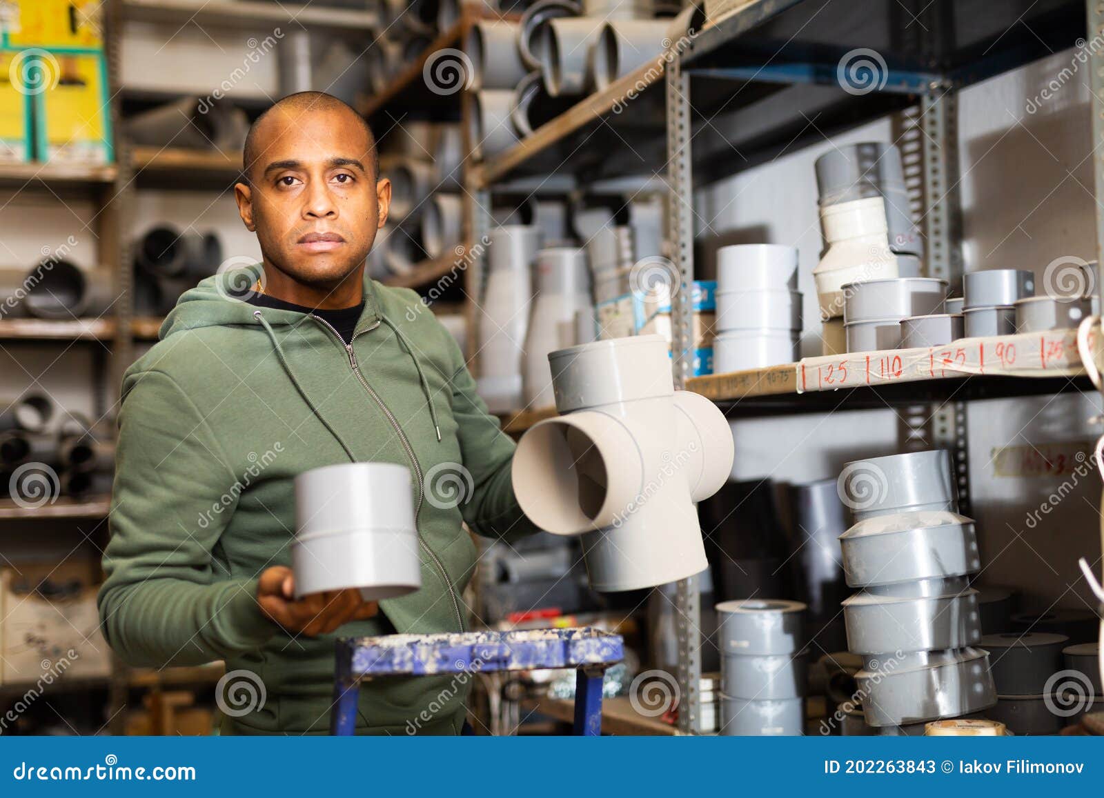 Buyer Selects Plumbing Fittings at Hardware Store Stock Image Image