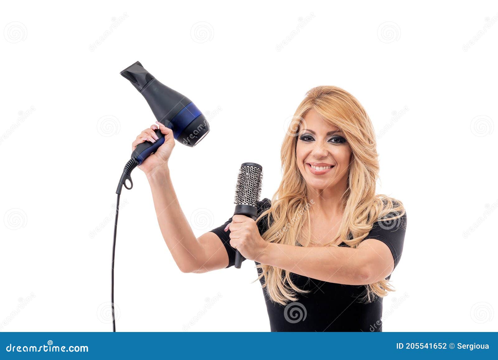 Mão feminina segurando secador de cabelo profissional isolado no