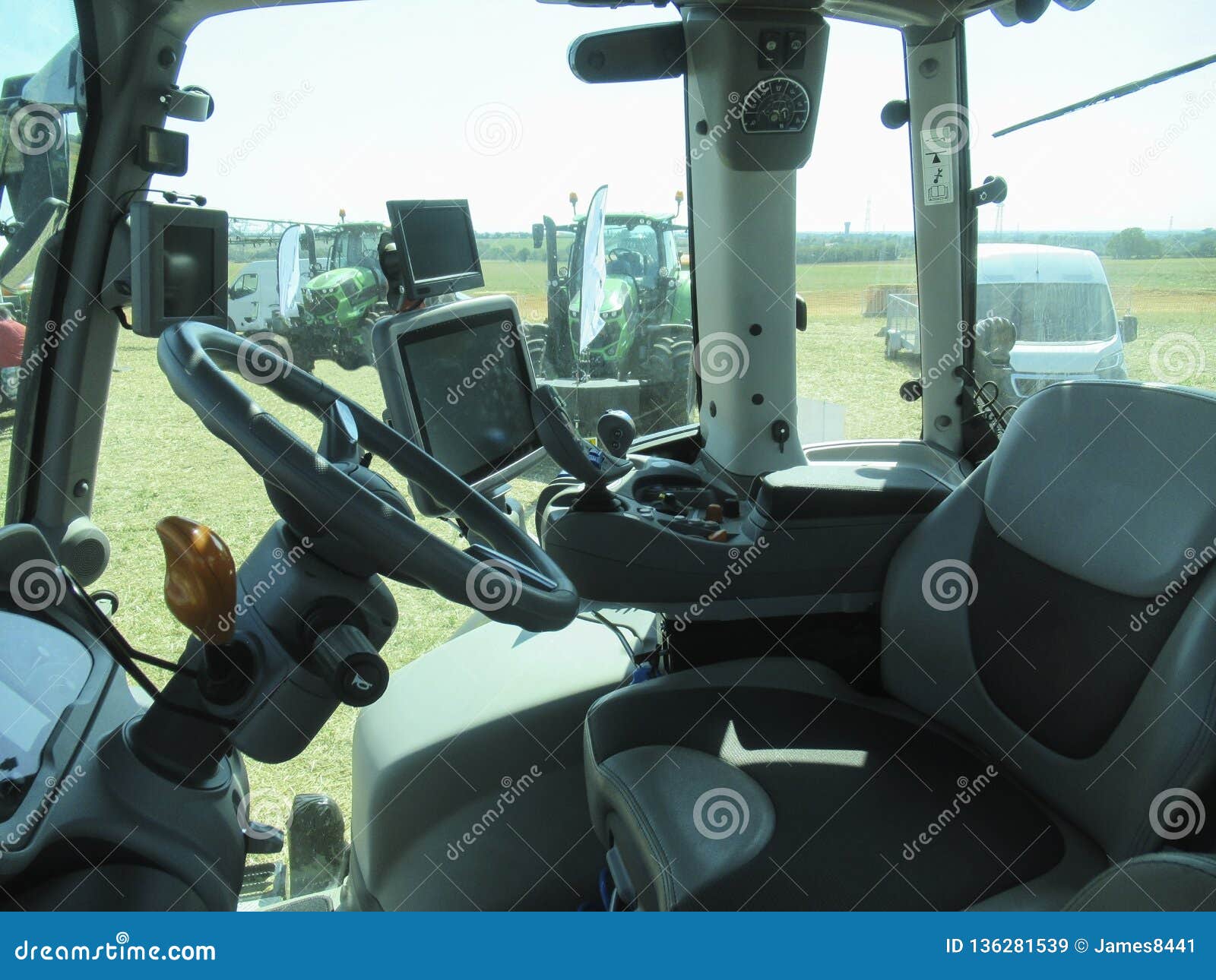 Cabin of a modern tractor. stock image. Image of agricultural 136281539