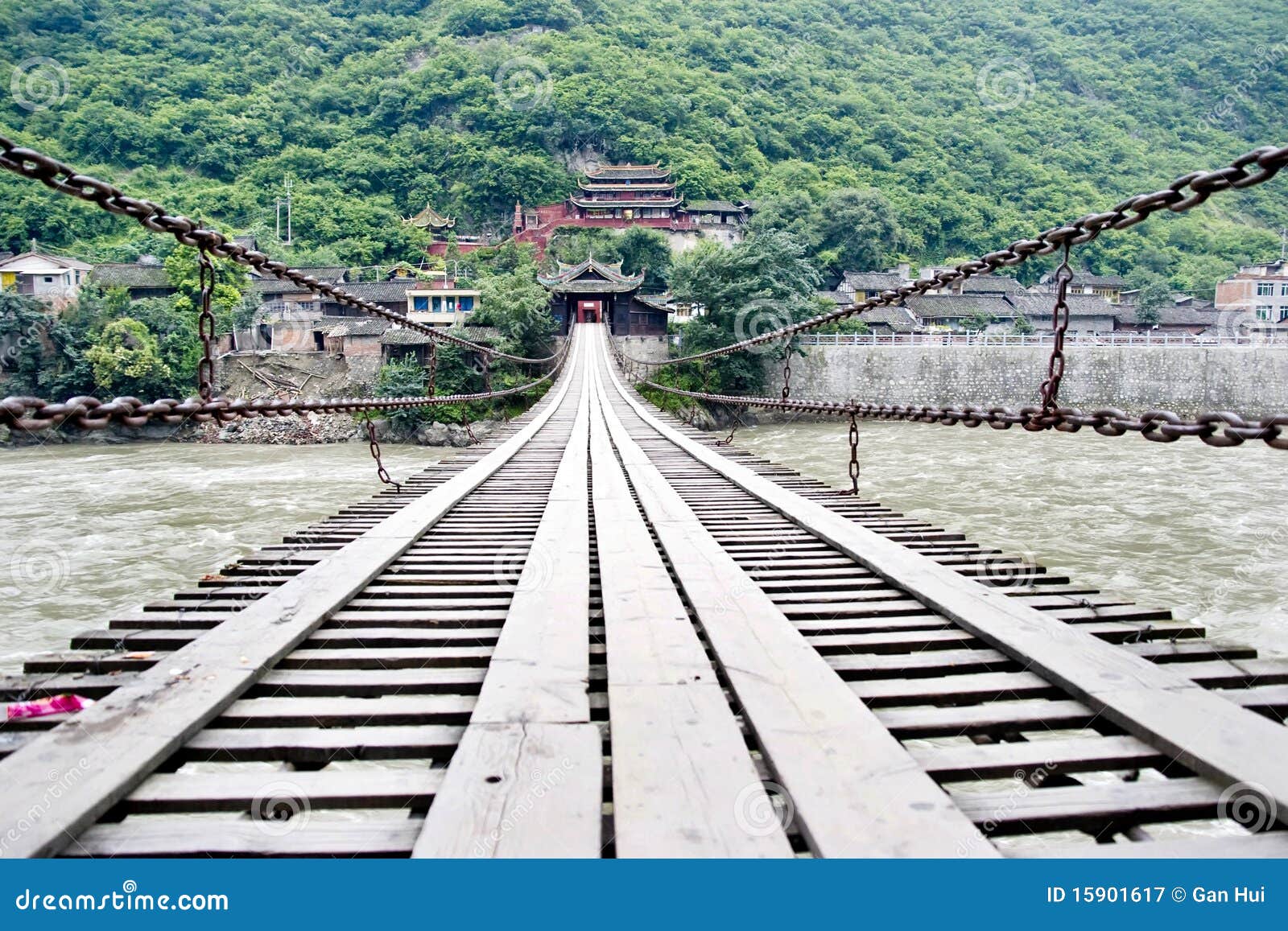Cable bridge over river stock image. Image of forest 15901617