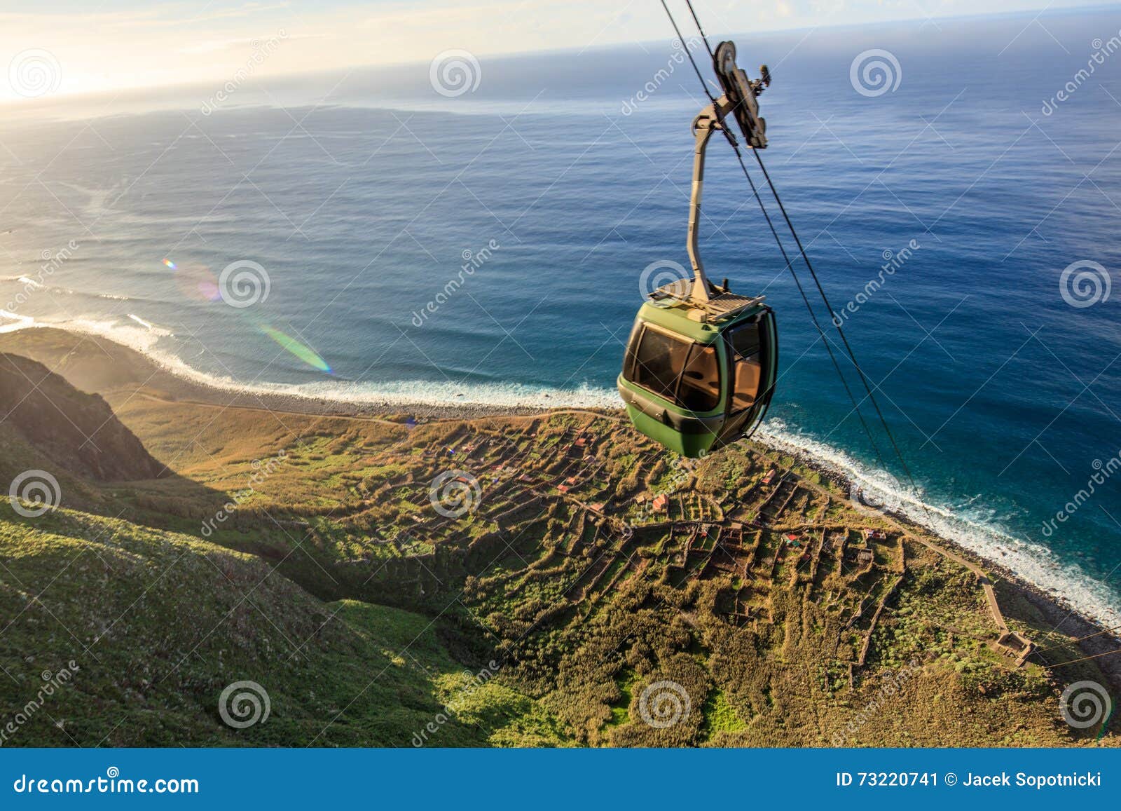 cable car going down along the cliffs, achadas da cruz, madeira