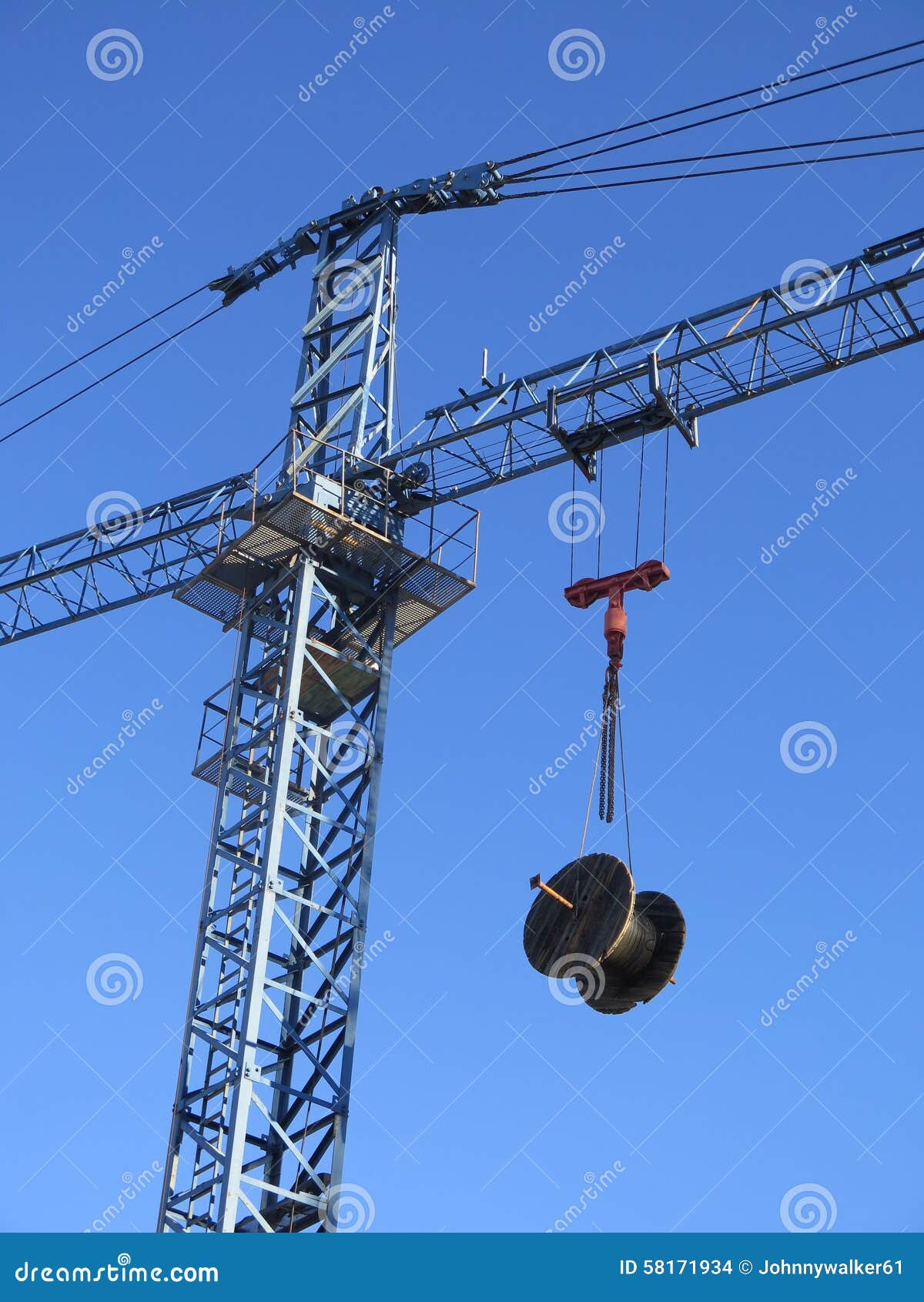 Cable drum on crane stock photo. Image of optic, hoisted 58171934