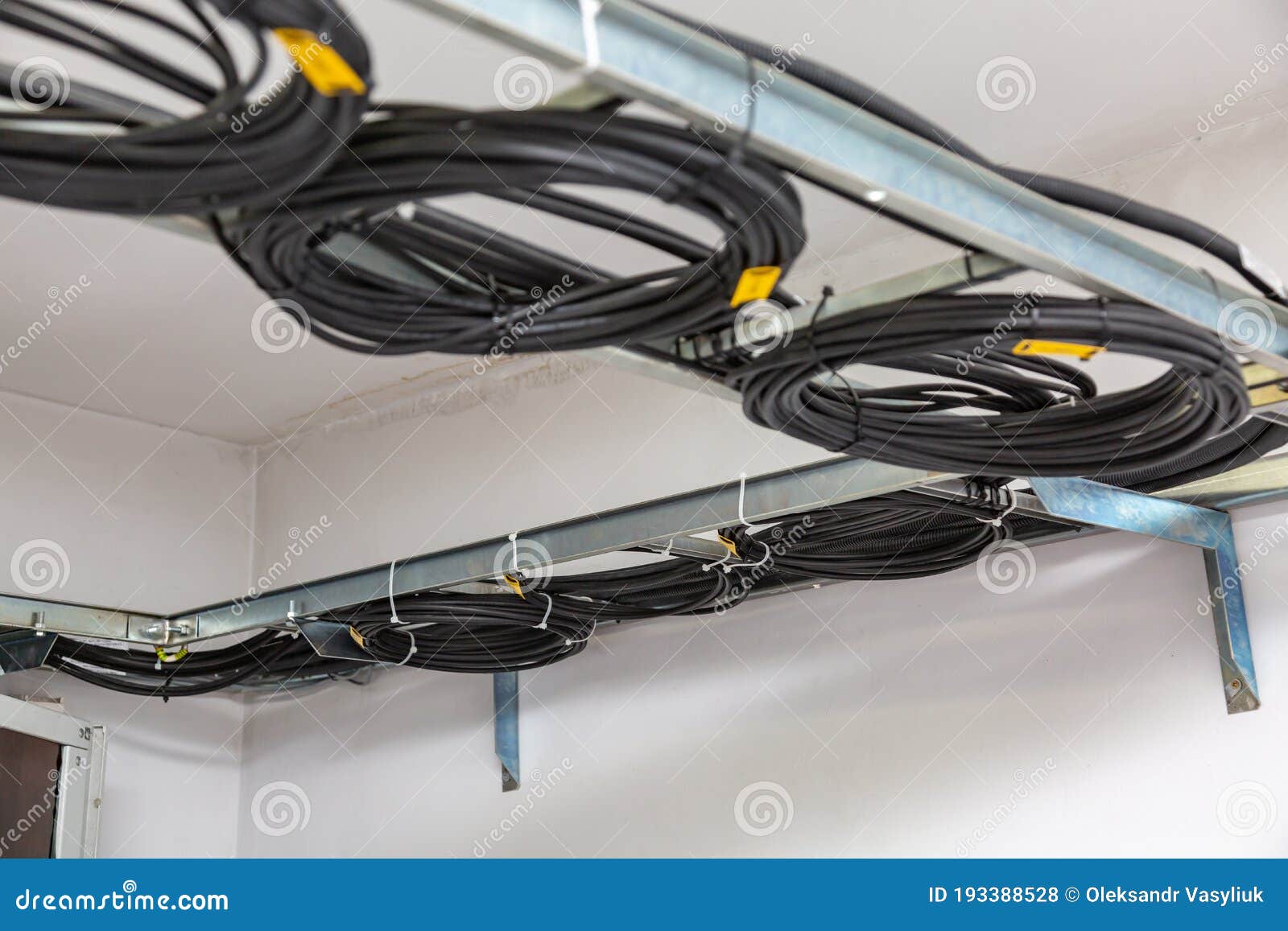 Cable Management. Working Wires, Black Cables Wound into a Coil, a Circle Stock Photo Image of