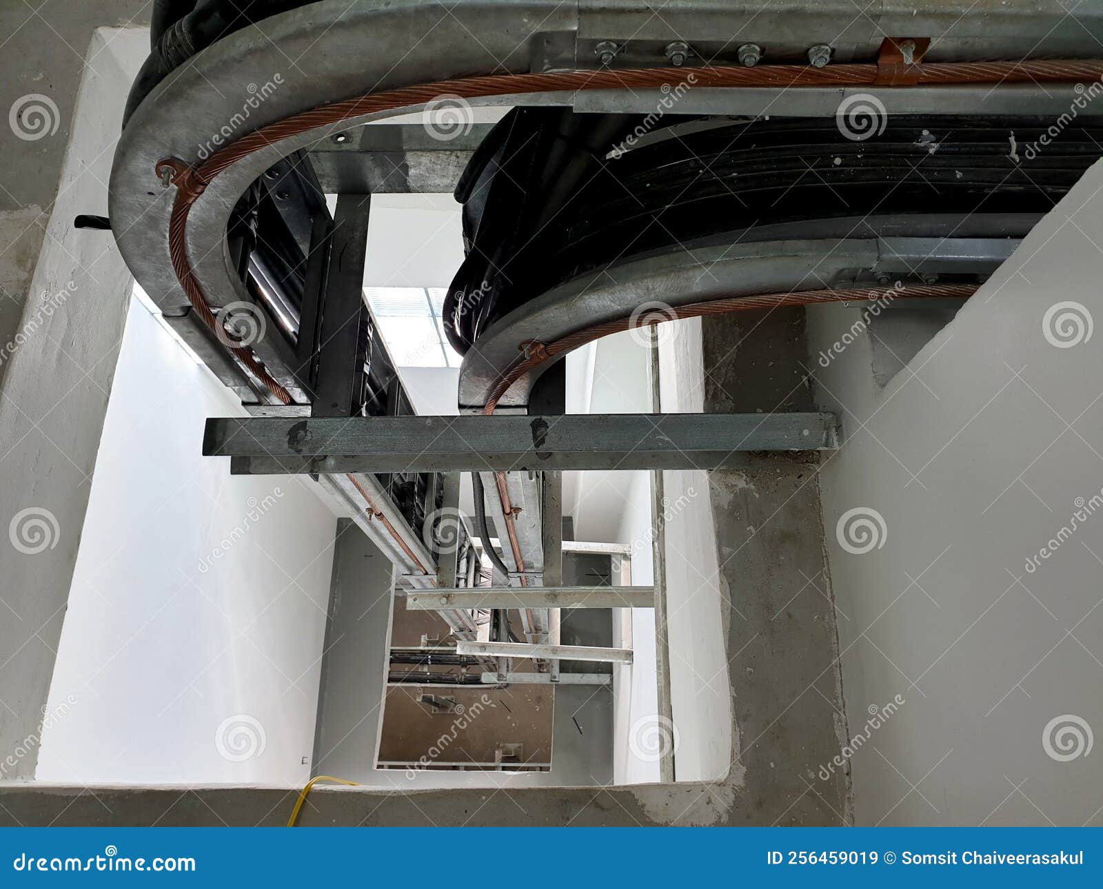 Cable Tray Installation between the First and Second Floors Stock Image