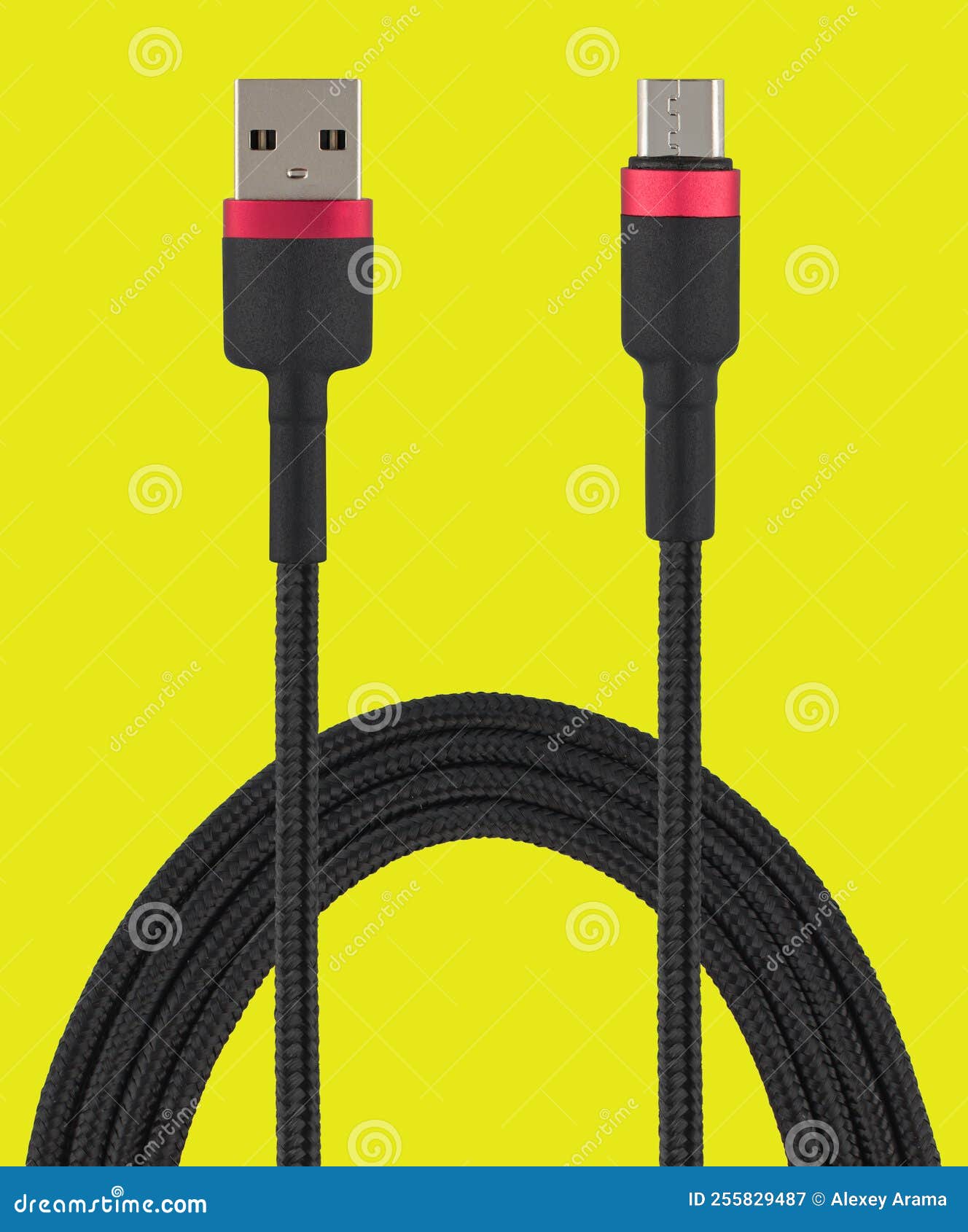 Cable with USB and Micro USB Connector, on a Yellow Background Stock