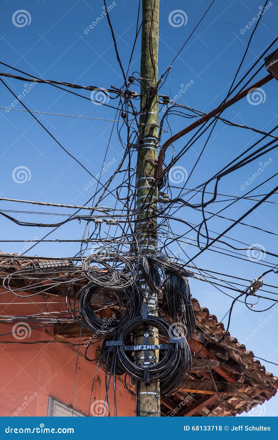 Cable TV &amp; electrical cables on a pole, Granada, Nicaragua, 3 Mar 2016