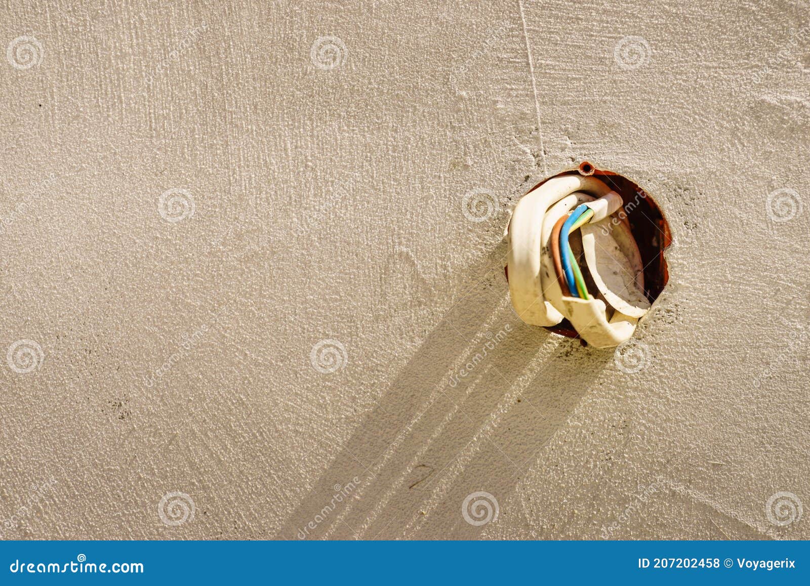 Cables in concrete wall stock photo. Image of electric - 207202458