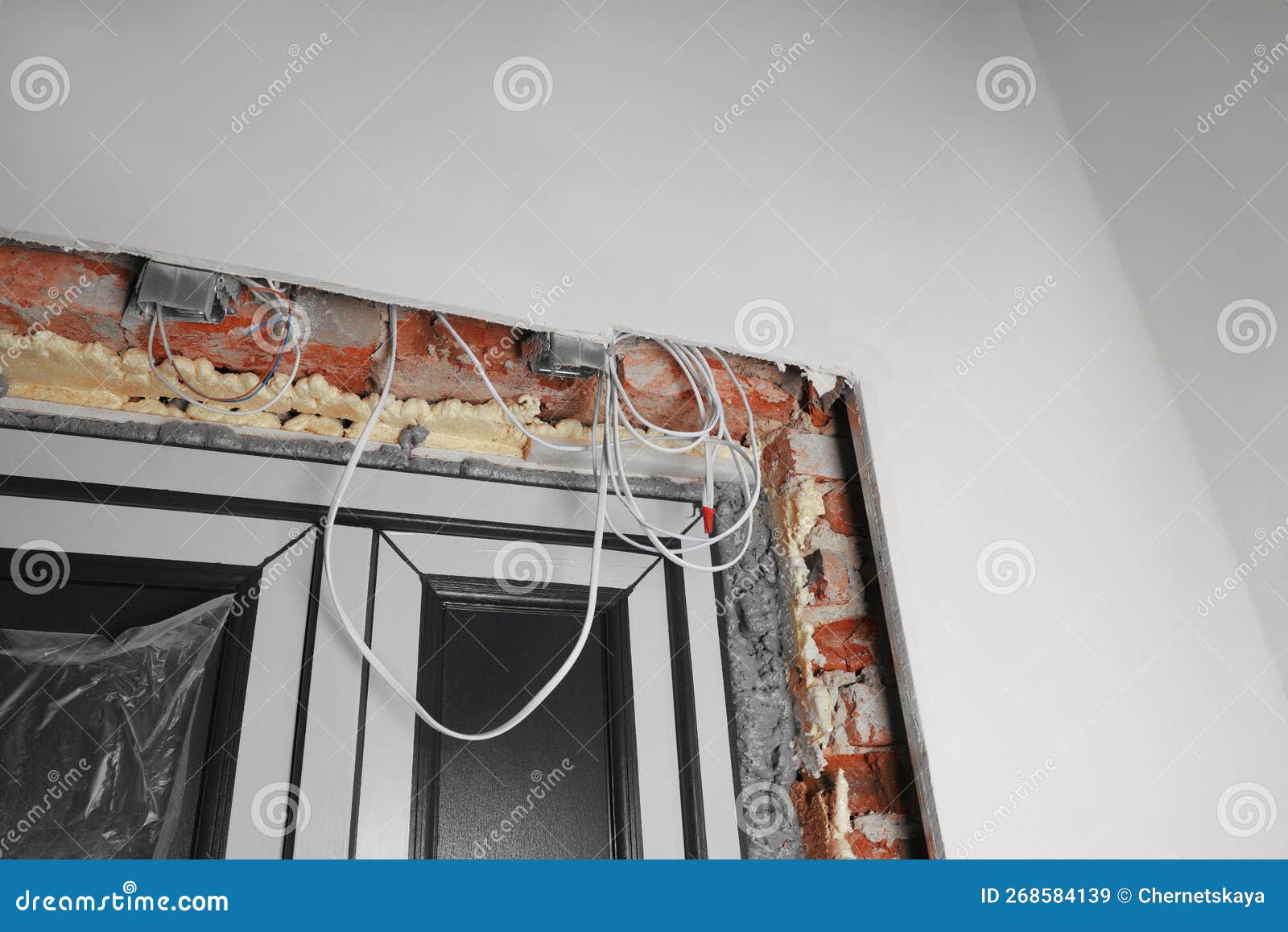 Cables in Wall Near Doors Indoors. Installation of Electrical Wiring Stock Image Image of