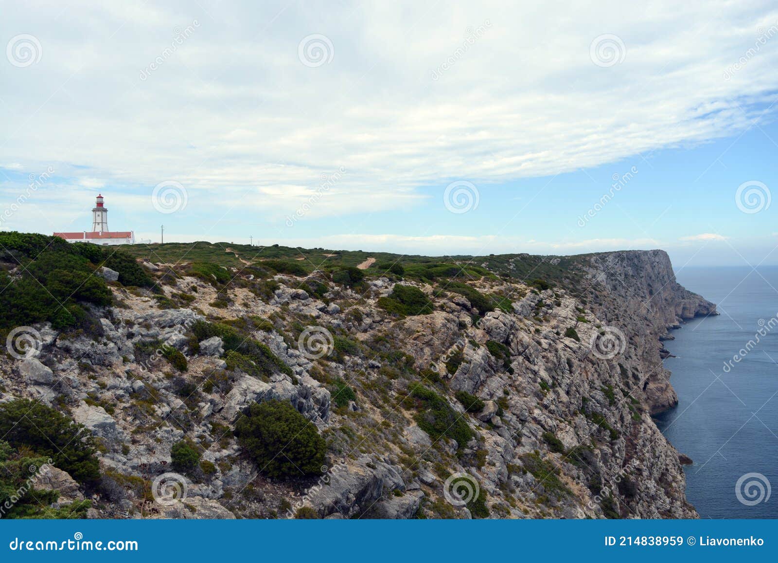 cabo espichel farol. especial cape lighthouse. portugal. landscape. shipping. help. sky. colorful background. blue red green white