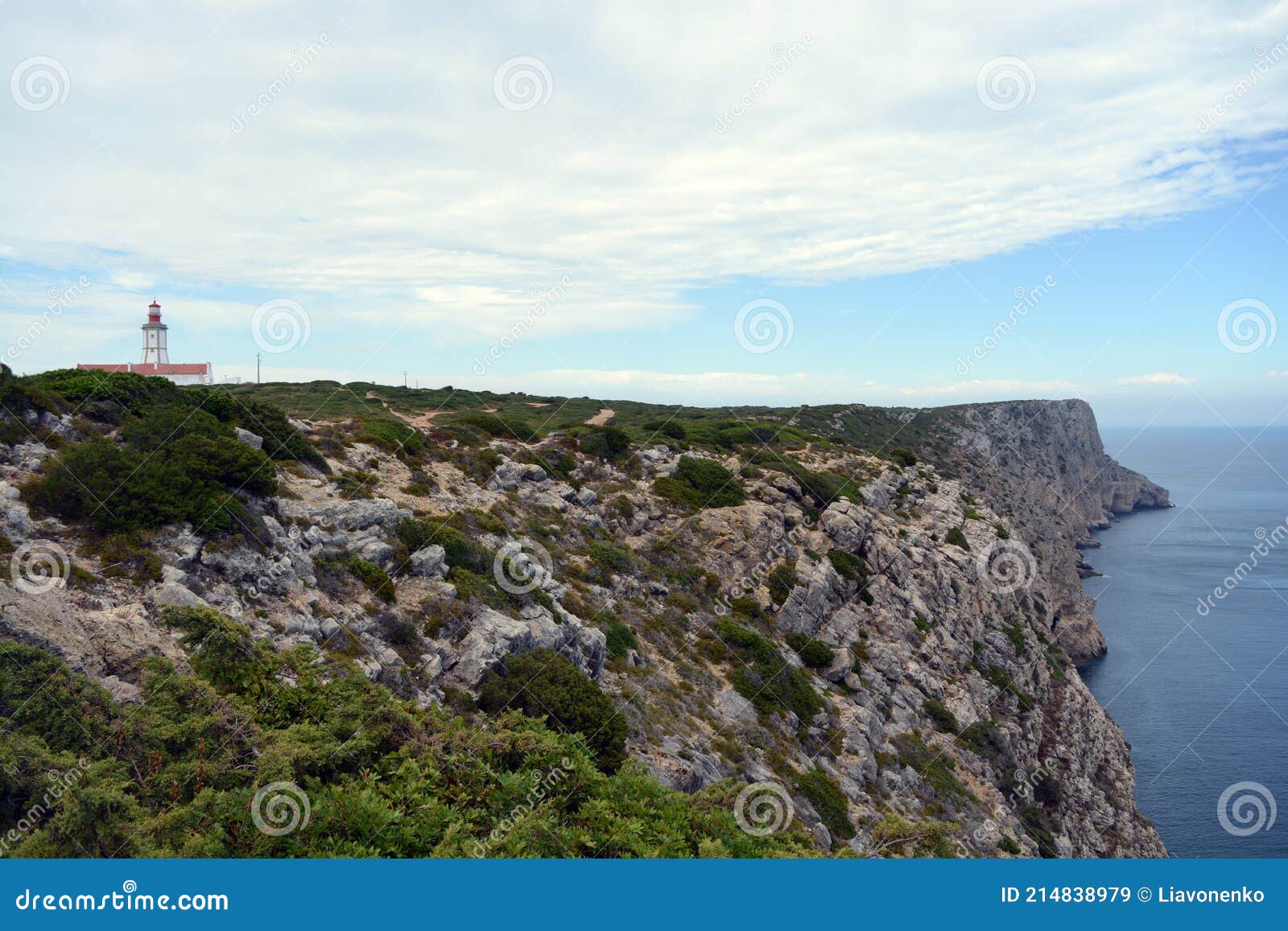 cabo espichel farol. especial cape lighthouse. portugal. landscape. shipping. help. sky. colorful background. blue red green white