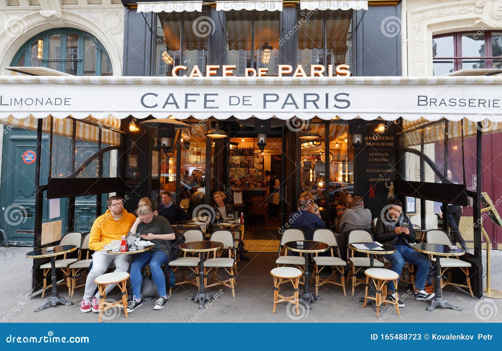 Cafe De Paris Is Traditional French Cafe Located In Historical Centre Of  Paris, Near The Louvre Museum. Editorial Stock Photo - Image Of Street,  Vintage: 165488723