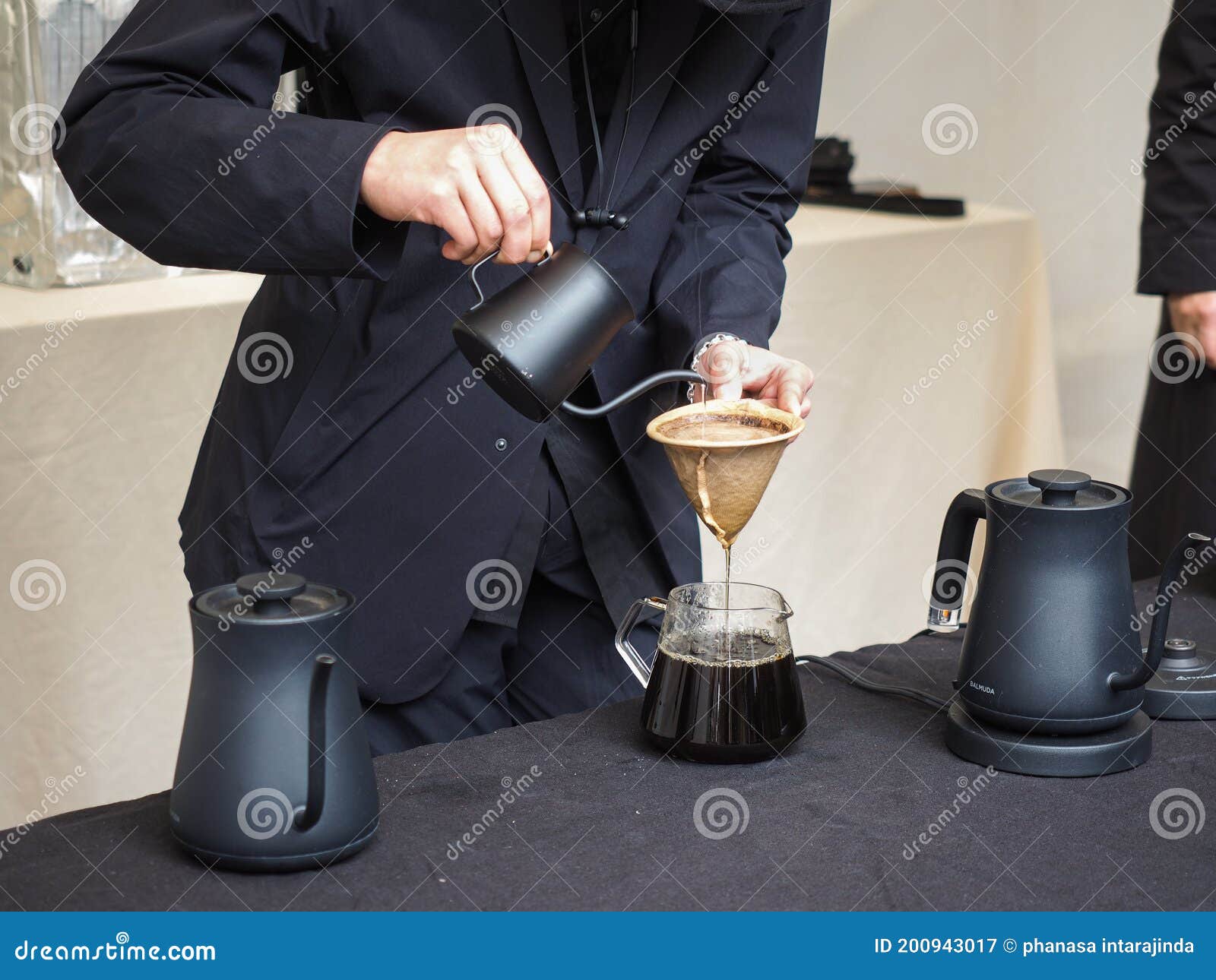 Cafe Professional Barista Brews Coffee by an Alternative Method in Pour