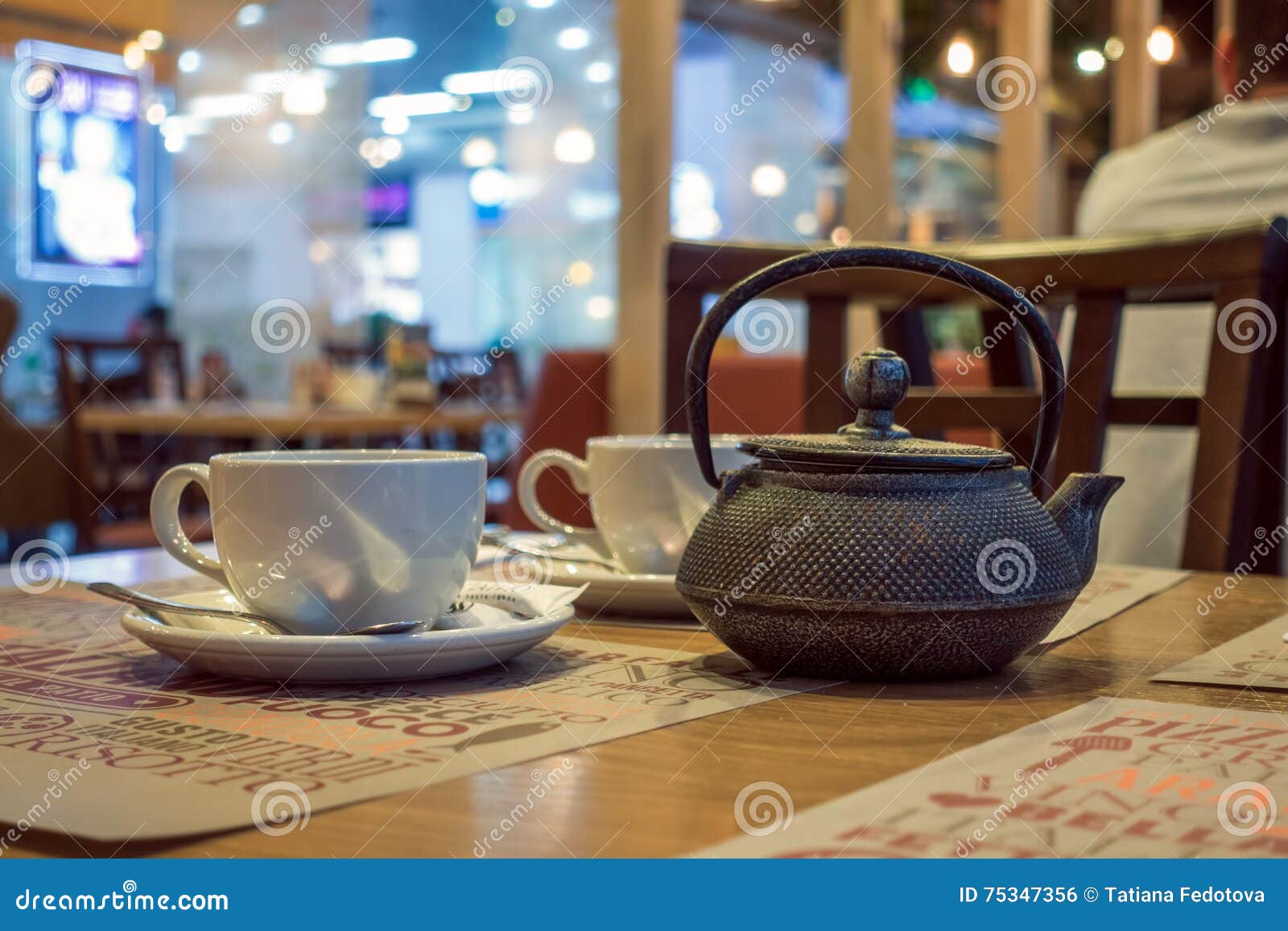 Cafe Table with Tea Kettle and White Cup Stock Photo Image of white