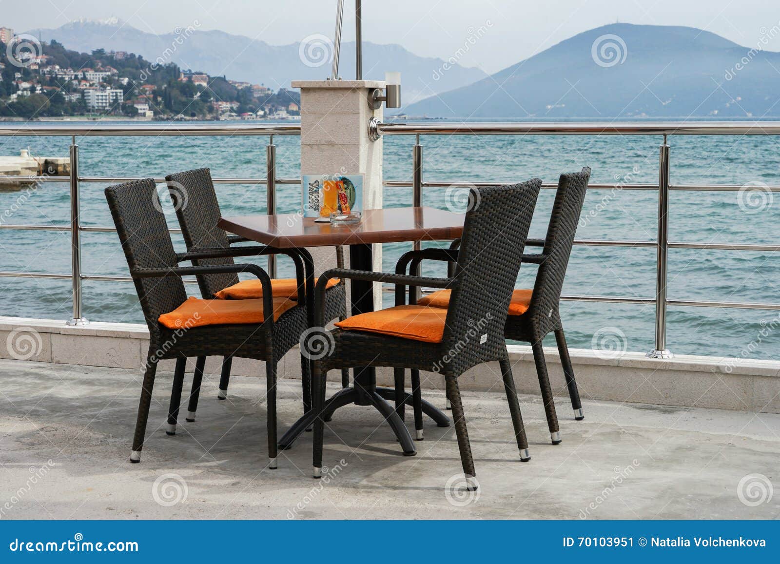Cafe on the waterfront editorial photo. Image of table 70103951
