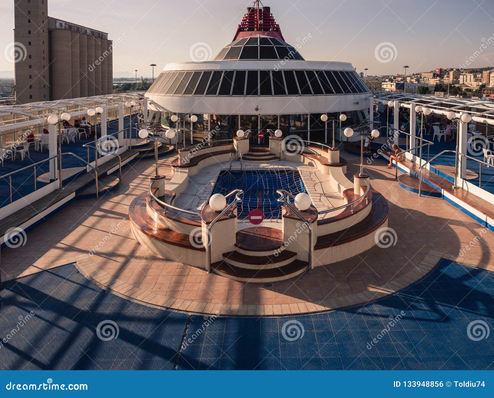 Upper Deck Of A Ferry With Swimming Pool At Sunset Editorial