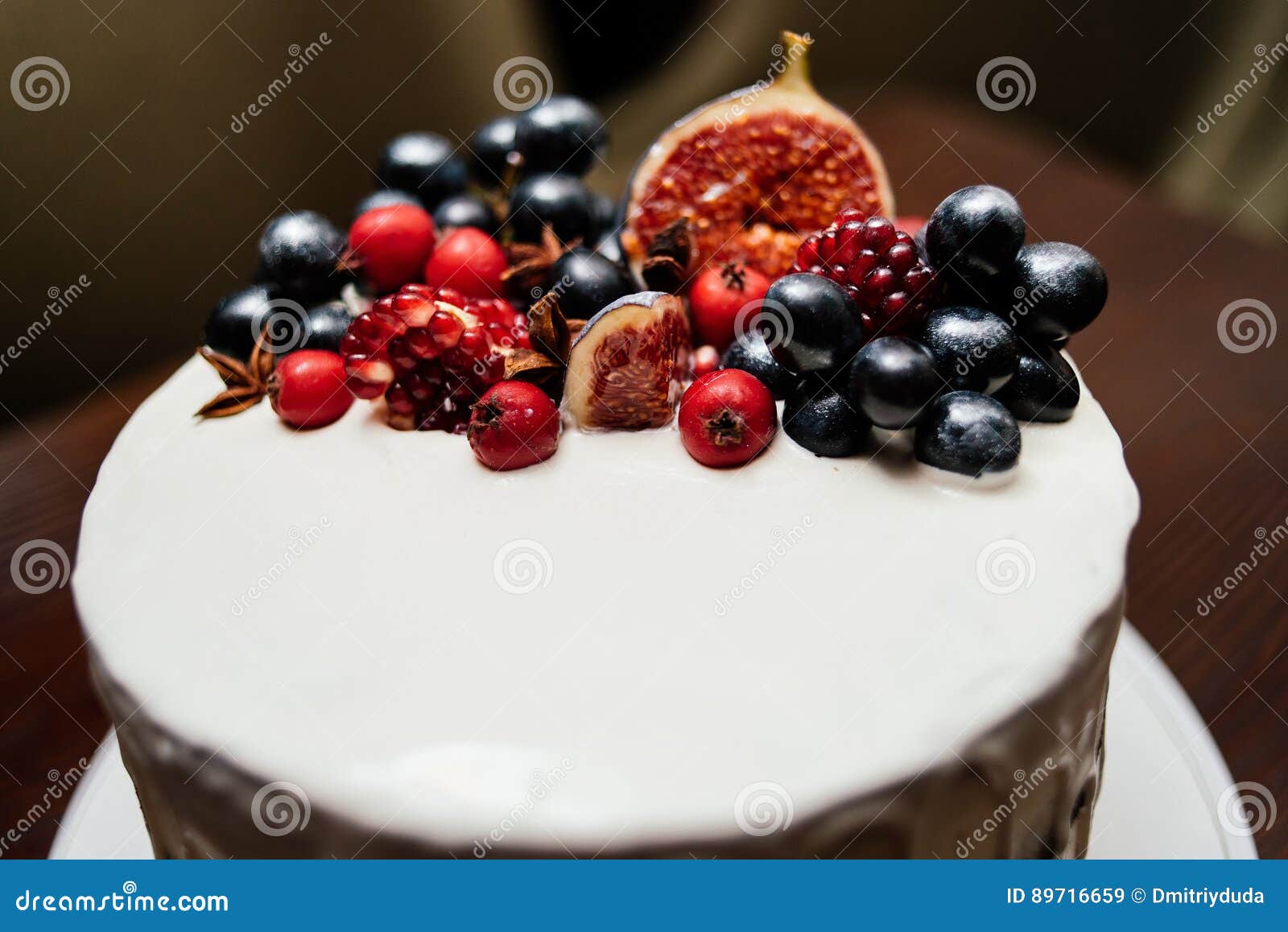 Cake Decorated With Fresh Fruits On The White Plate Stock Image