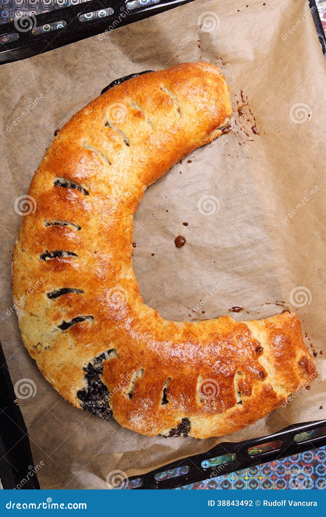 Cake filled with plum jam stock photo. Image of browned 38843492