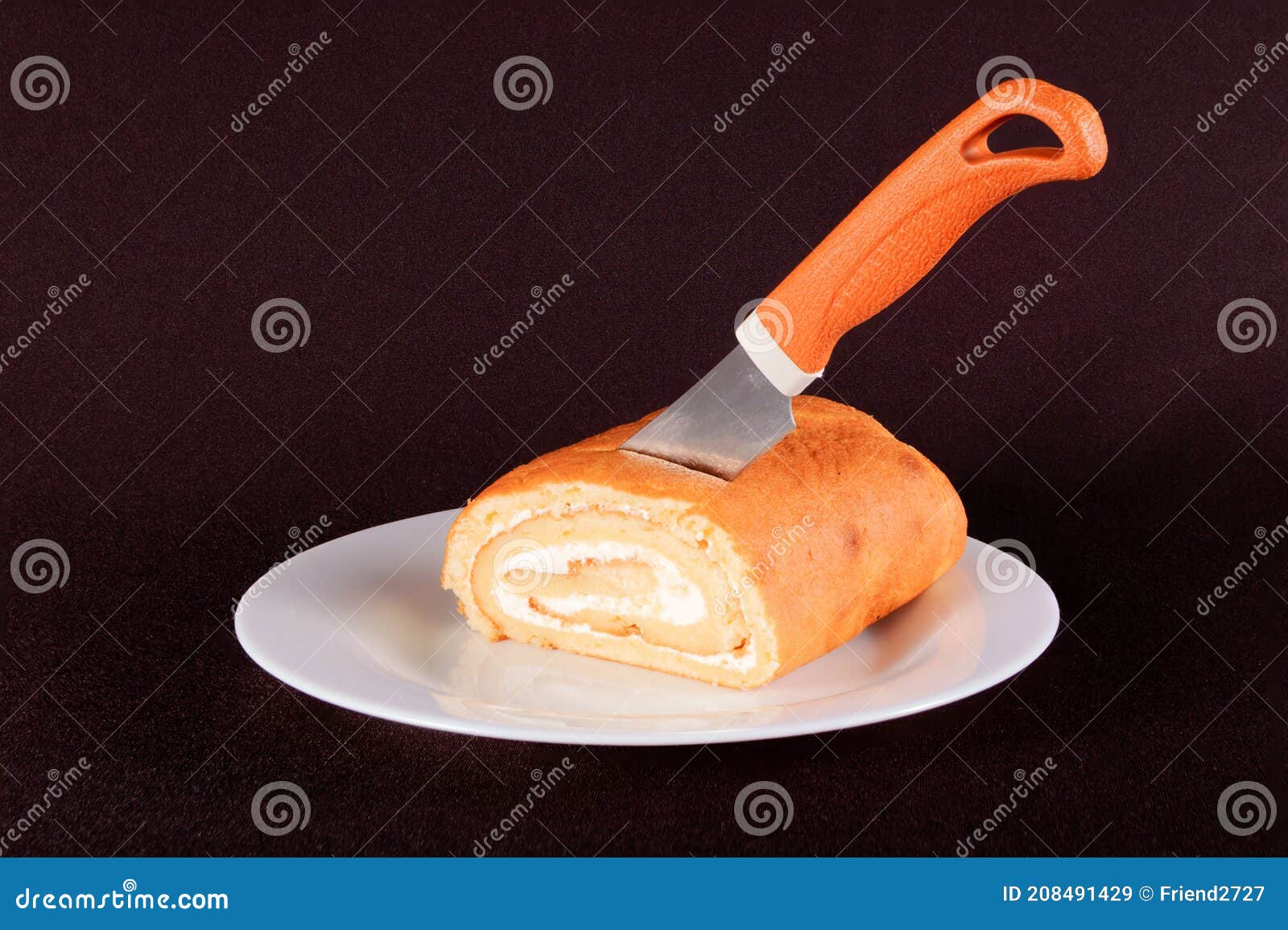 Cake with a Knife on a White Background Isolate Stock Image - Image of