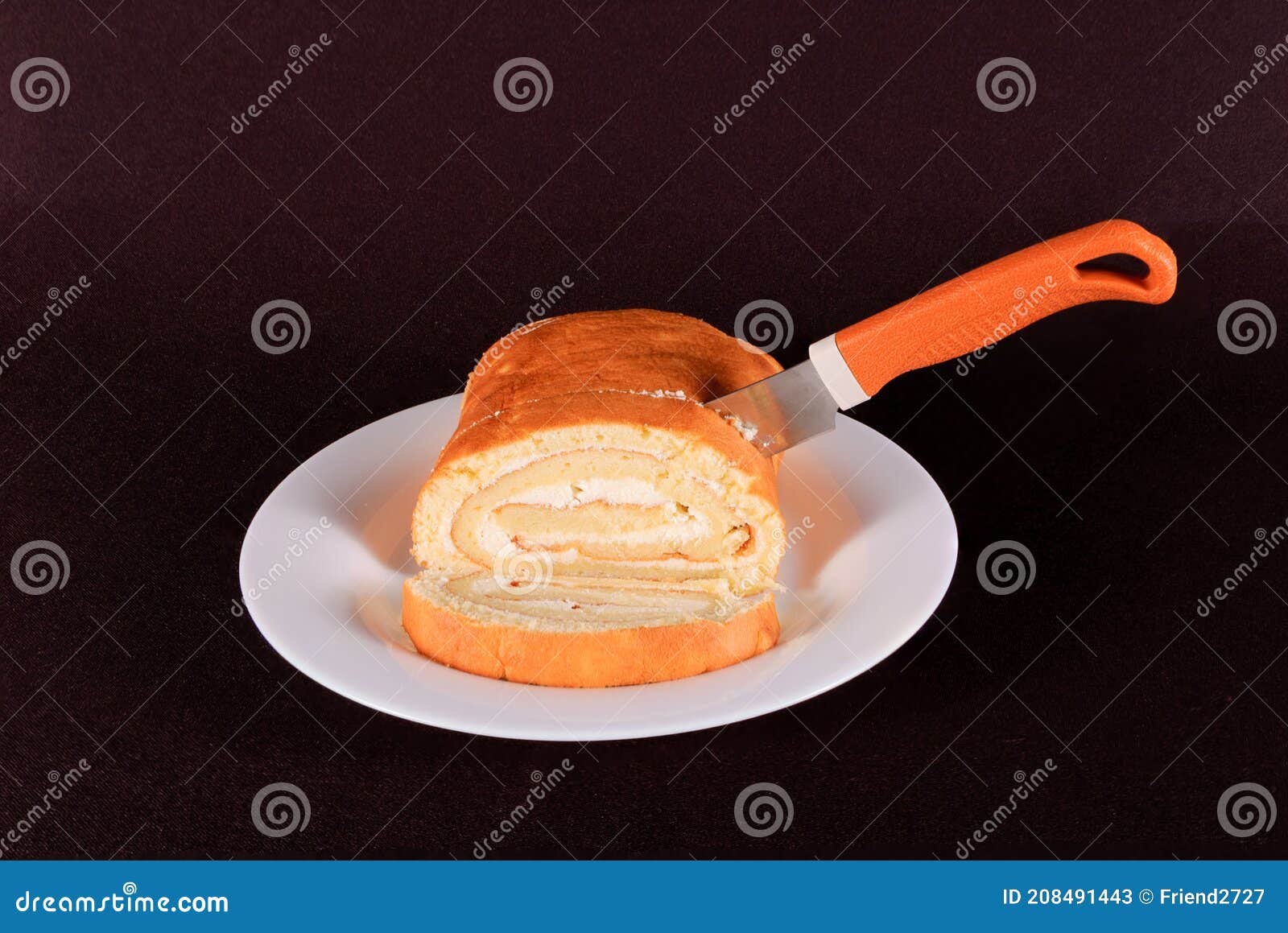 Cake with a Knife on a White Background Isolate Stock Image - Image of