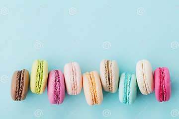 Cake Macaron or Macaroon on Turquoise Background from Above, Colorful ...