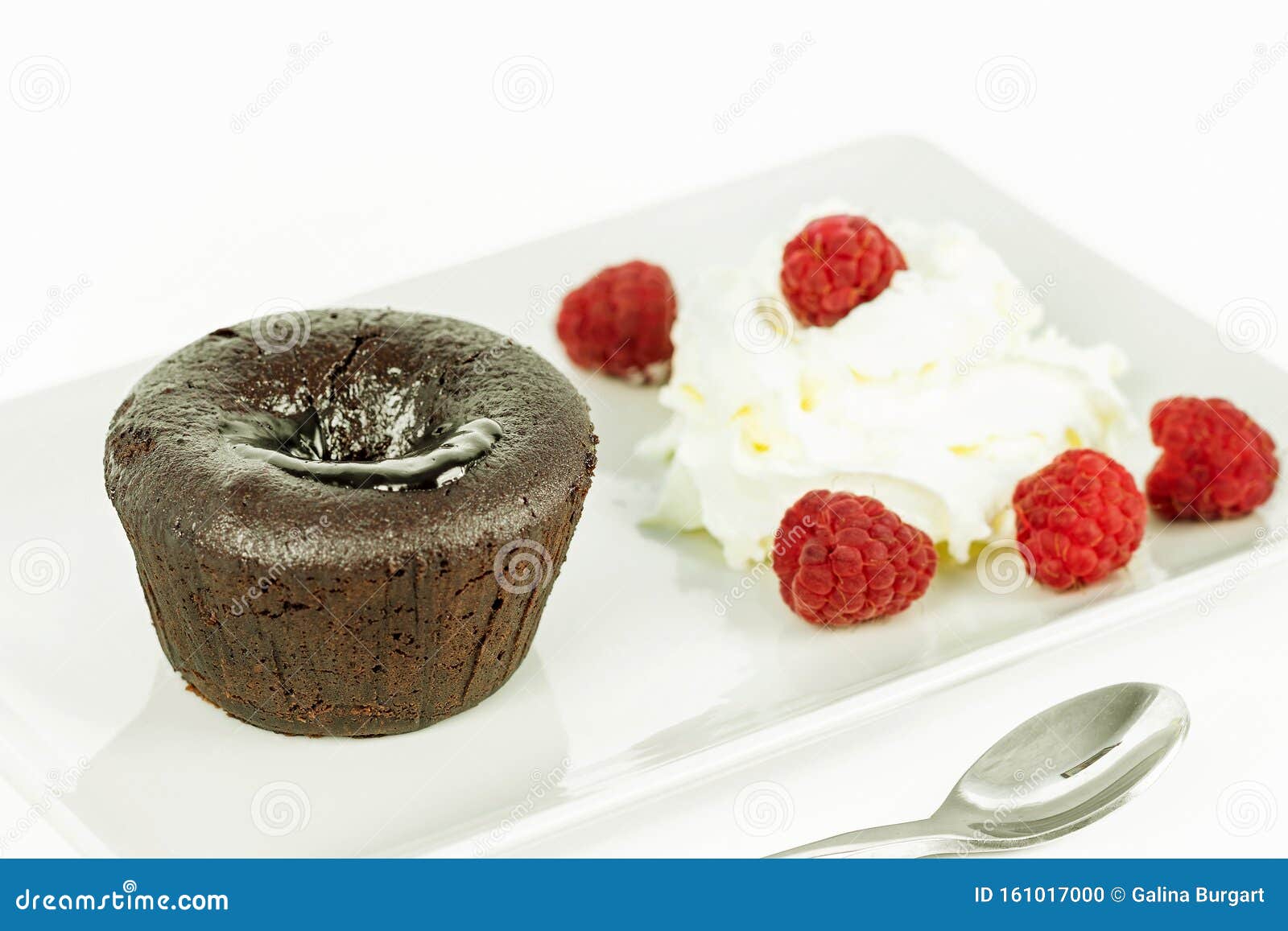 cake volkano of chocolate with cream and raspberry.