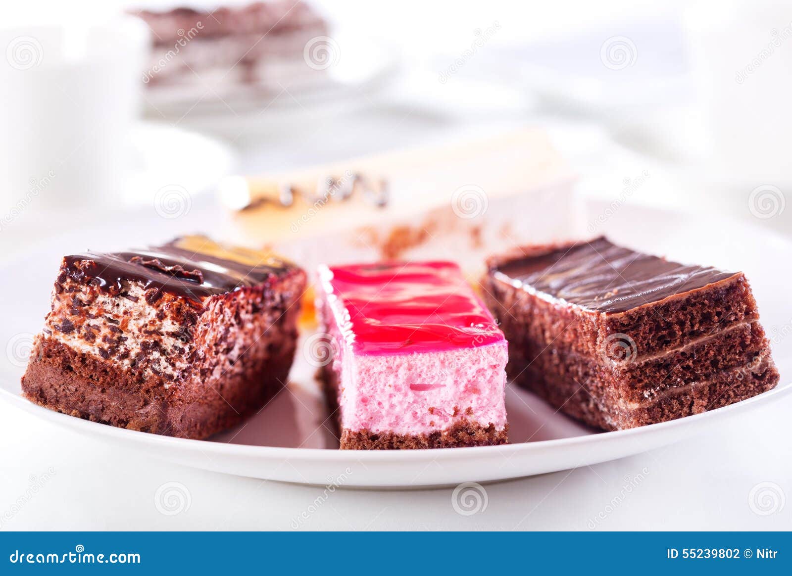Cakes on a plate stock photo. Image of layer, plate, slice 55239802