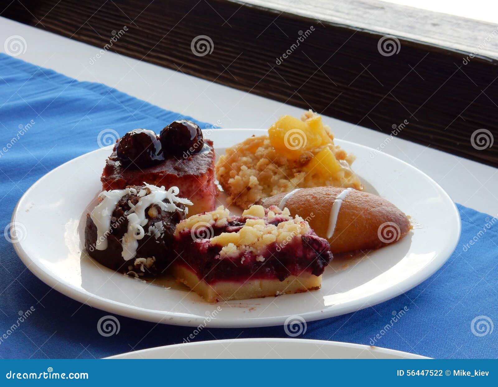 Cakes on a plate stock photo. Image of biscuits, cookies 56447522