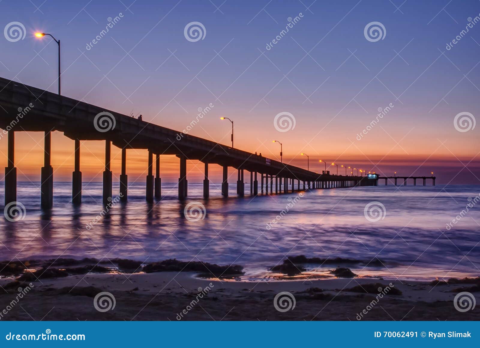 pier at ocean beach in san diego, california at sunset