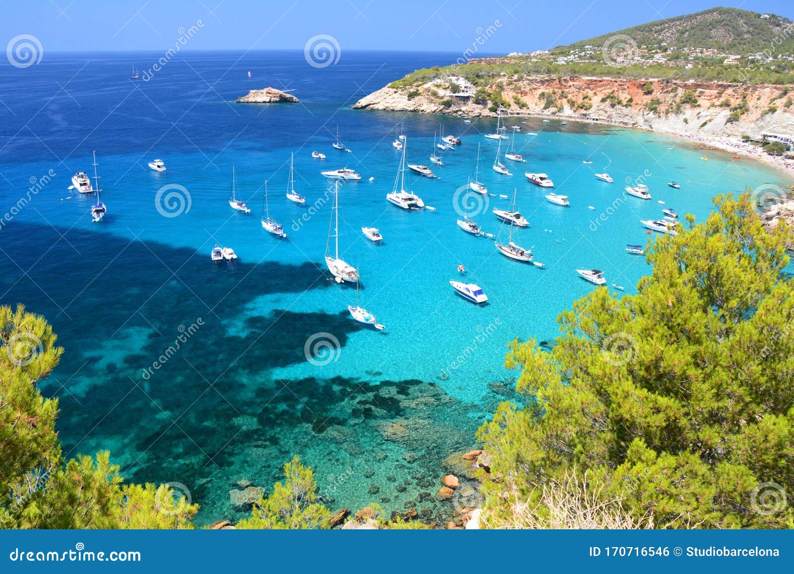 cala d`hort bay with beach and turquoise water on ibiza