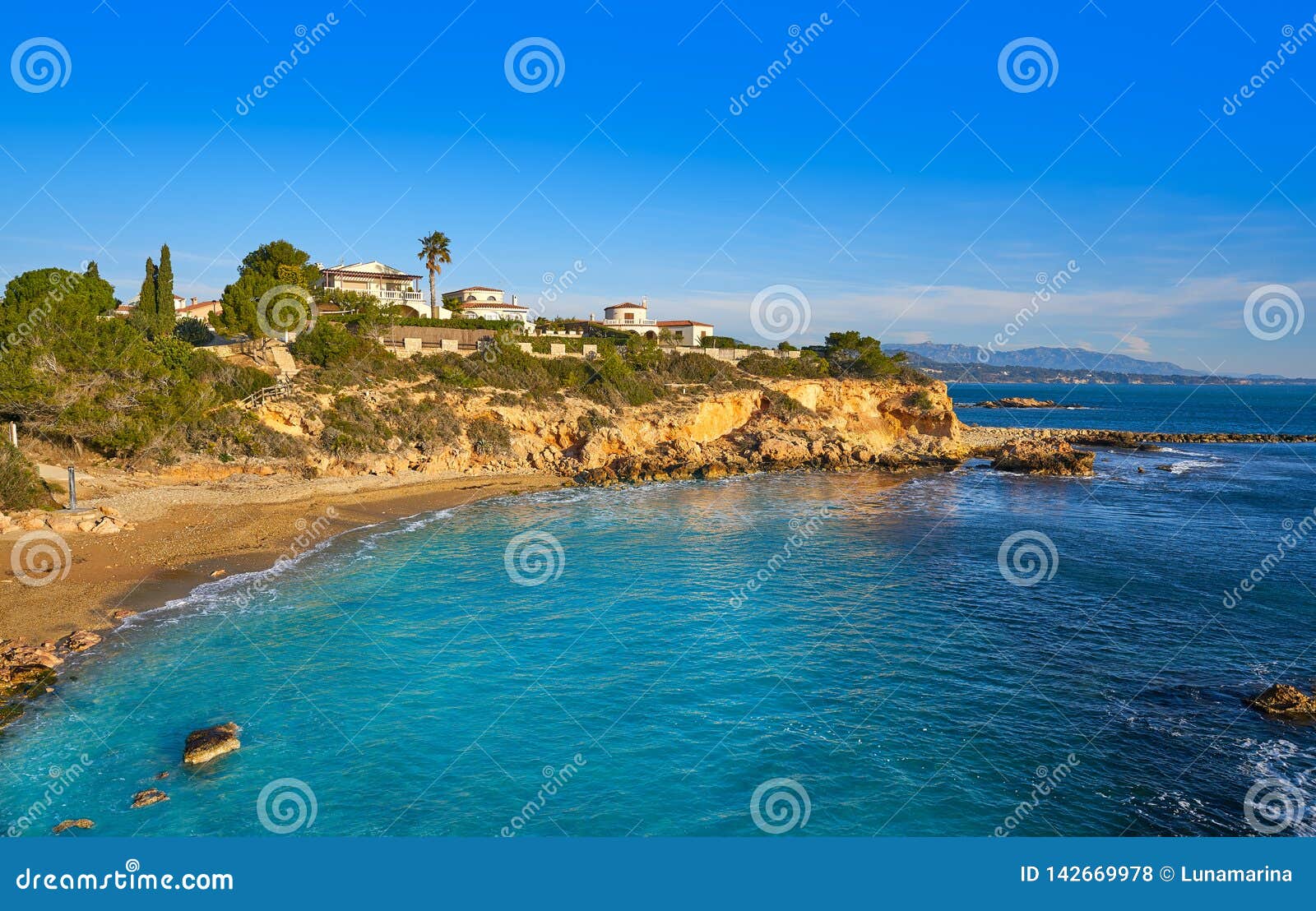 cala la buena beach in el perello beach